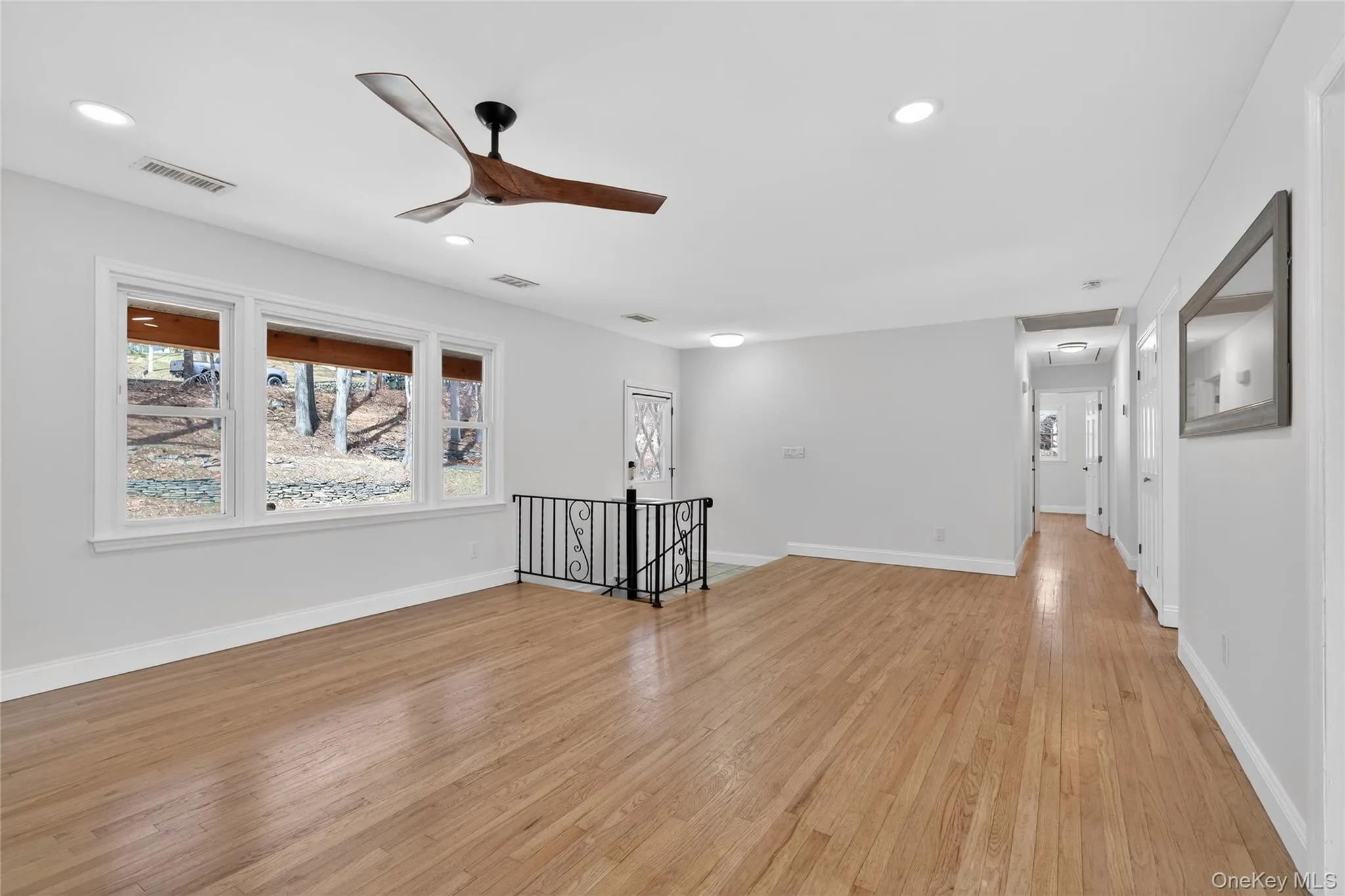Heading down the hall from the living room on the first level are three bedrooms and a full bath... Heading down the hall from the living room on the first level are three bedrooms and a full bath...