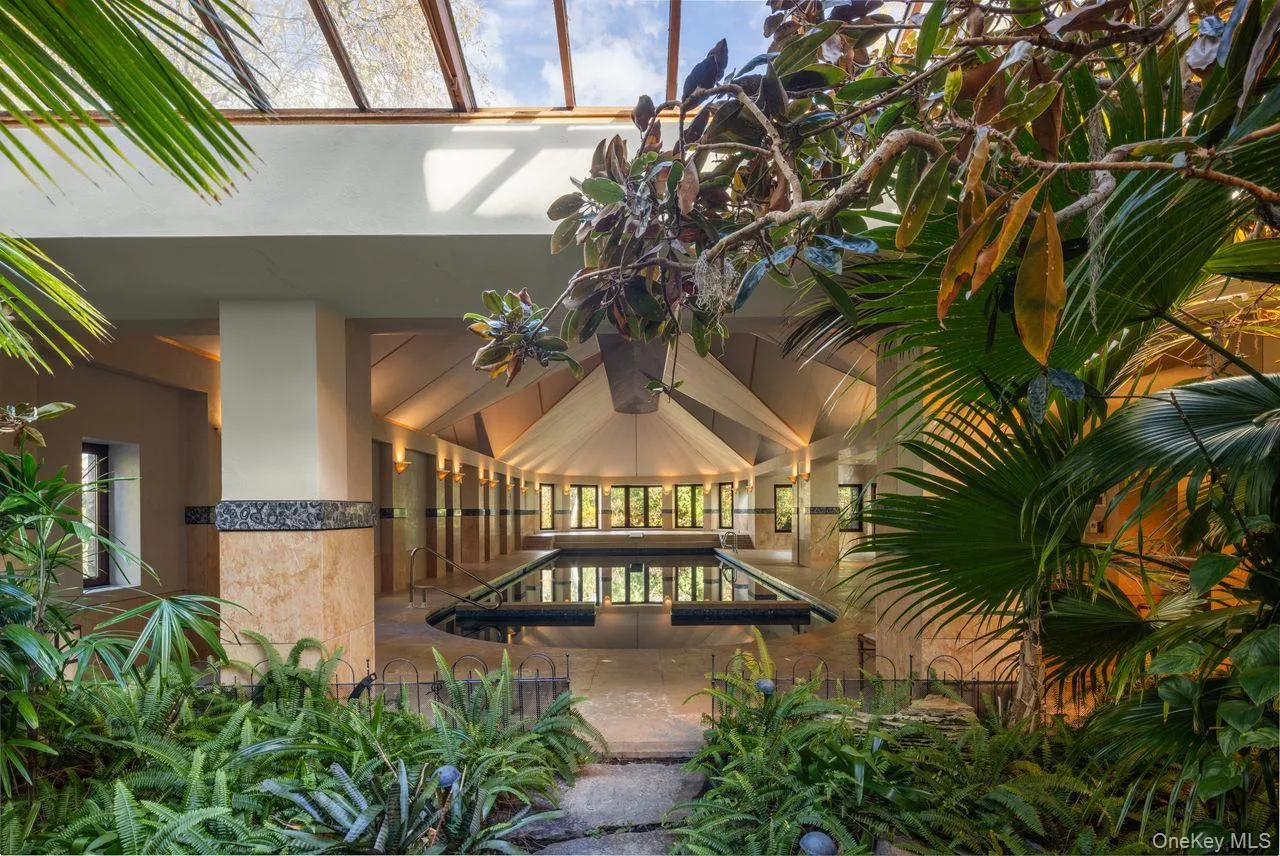 The indoor pool wing is as functional as it is breathtaking. For large scale events, it has been transformed into an event space for 100+ guests by covering the pool. The indoor pool wing is as functional as it is breathtaking. For large scale events, it has been transformed into an event space for 100+ guests by covering the pool.