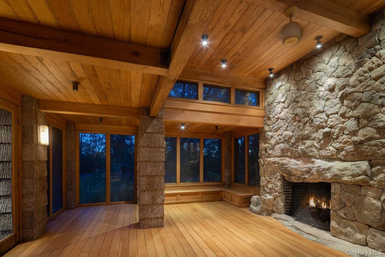 Designed as a place for contemplation and meditation, it offers a serene atmosphere enhanced by a large wood burning fireplace. This peaceful setting invites reflection, connection, or simply the quiet enjoyment of nature. Designed as a place for contemplation and meditation, it offers a serene atmosphere enhanced by a large wood burning fireplace. This peaceful setting invites reflection, connection, or simply the quiet enjoyment of nature.