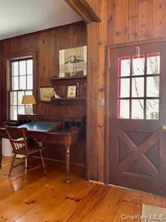Inviting entryway welcomes you with warm wood accents and natural light. Inviting entryway welcomes you with warm wood accents and natural light.