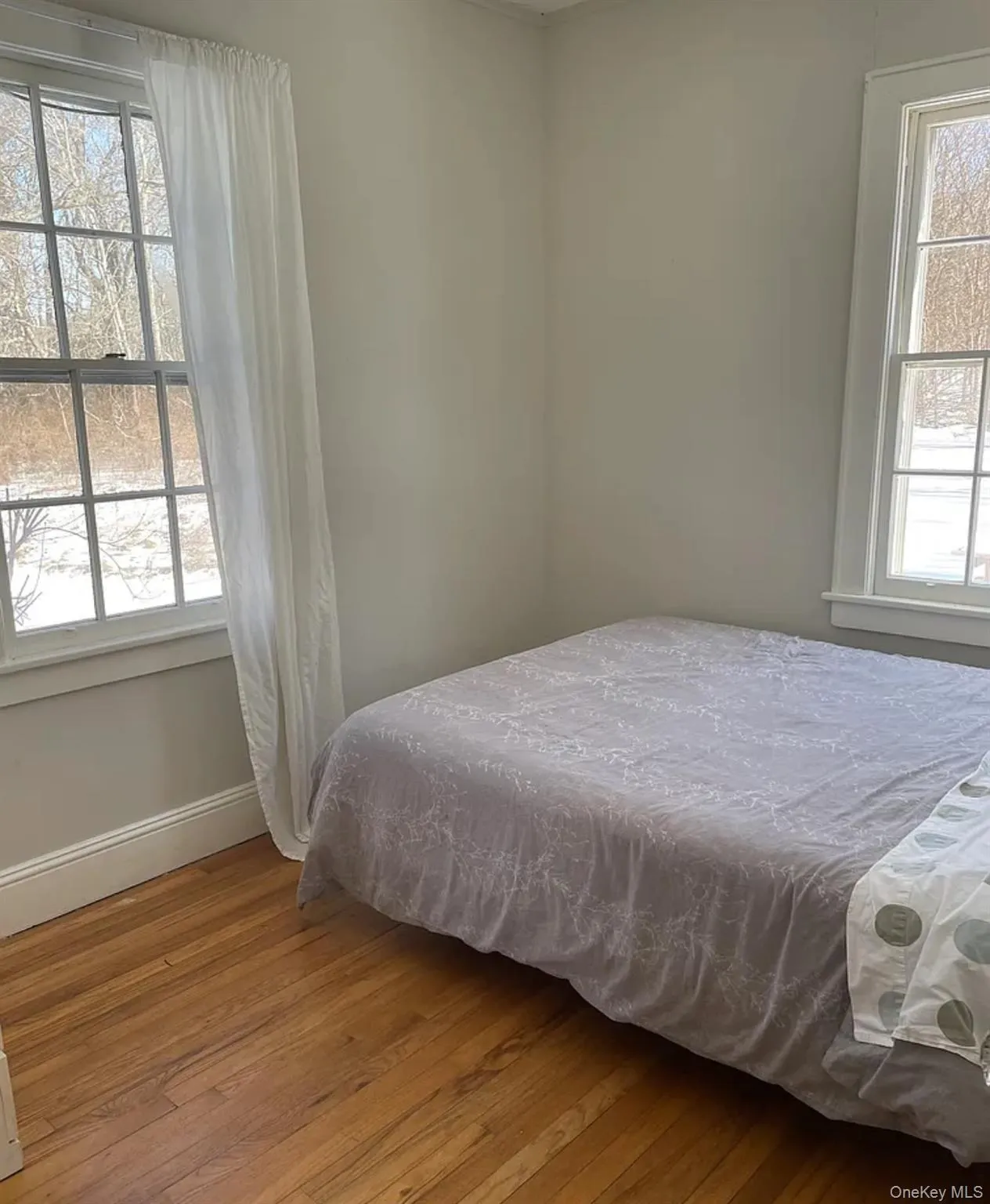 Secondary bedroom is perfect for guests, work, or creative space Secondary bedroom is perfect for guests, work, or creative space