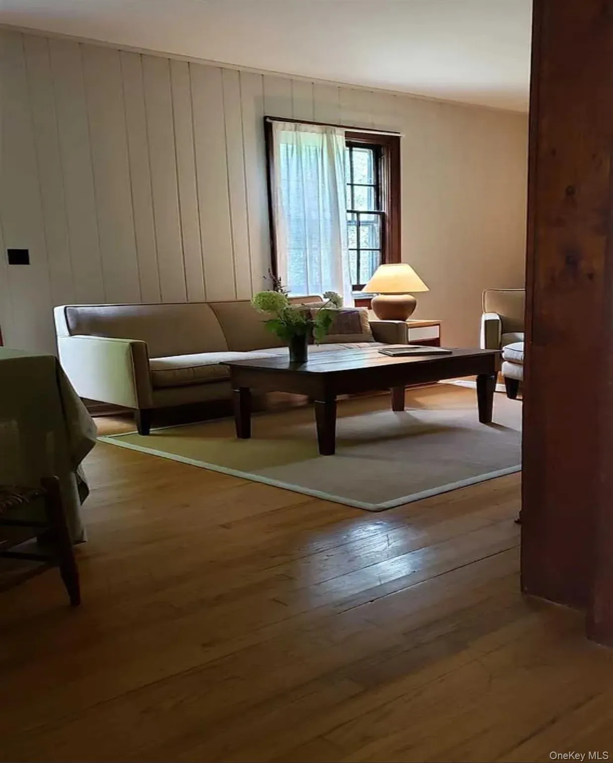 Cozy living room features soft textures and classic pine details throughout Cozy living room features soft textures and classic pine details throughout