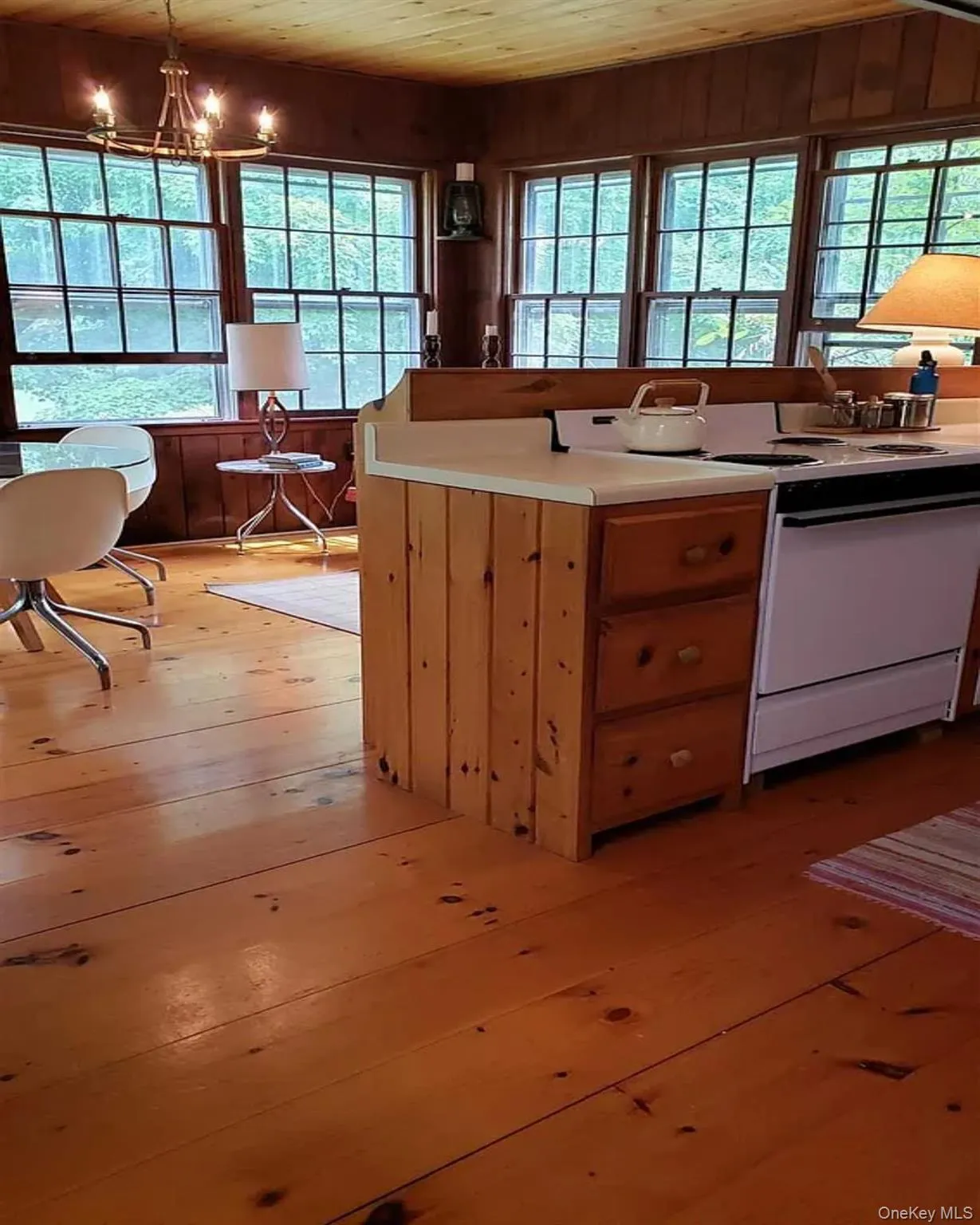 Eclectic living area opens seamlessly to the kitchen and dining room for easy, connected living Eclectic living area opens seamlessly to the kitchen and dining room for easy, connected living