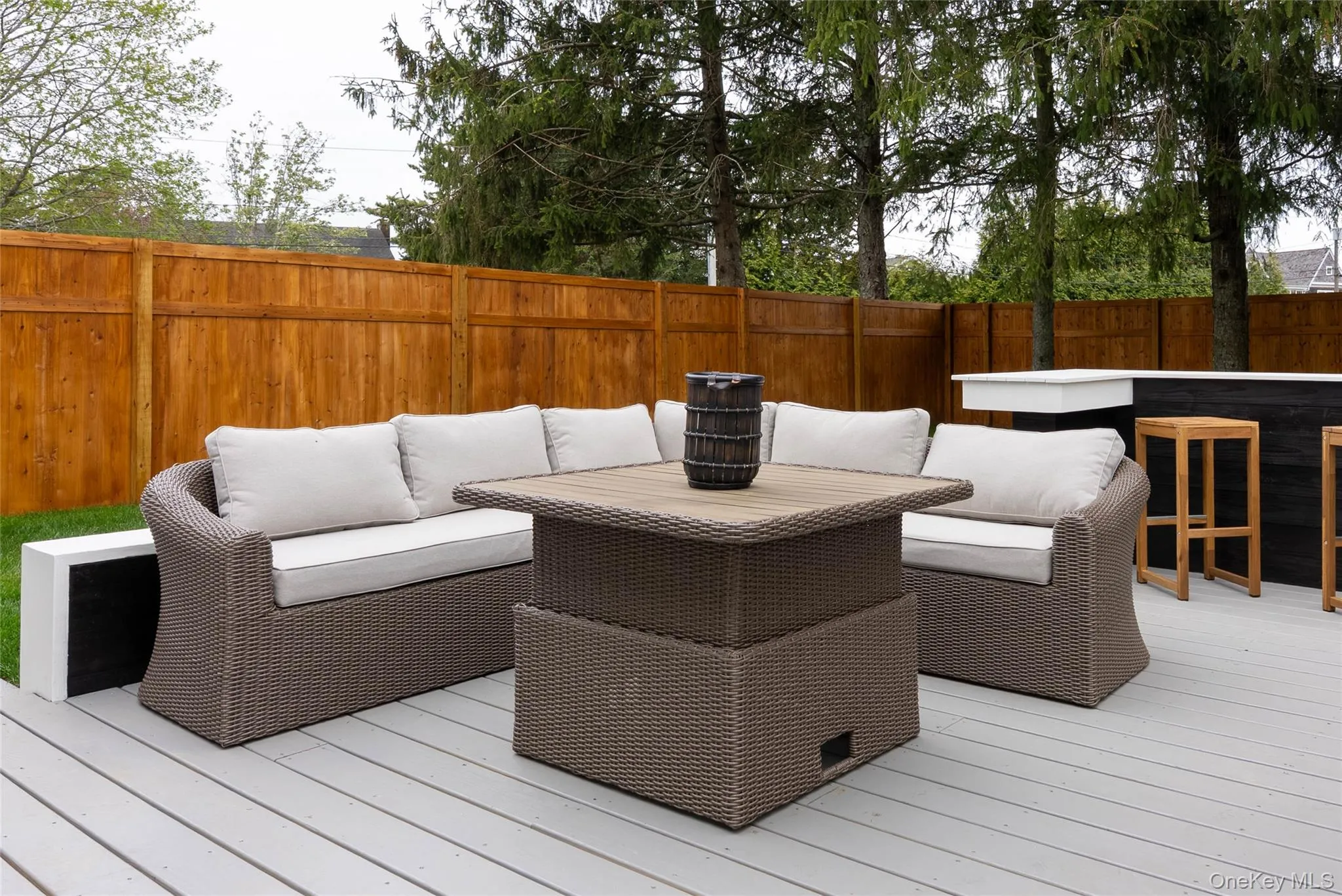 Deck featuring an outdoor hangout area and a fenced backyard Deck featuring an outdoor hangout area and a fenced backyard