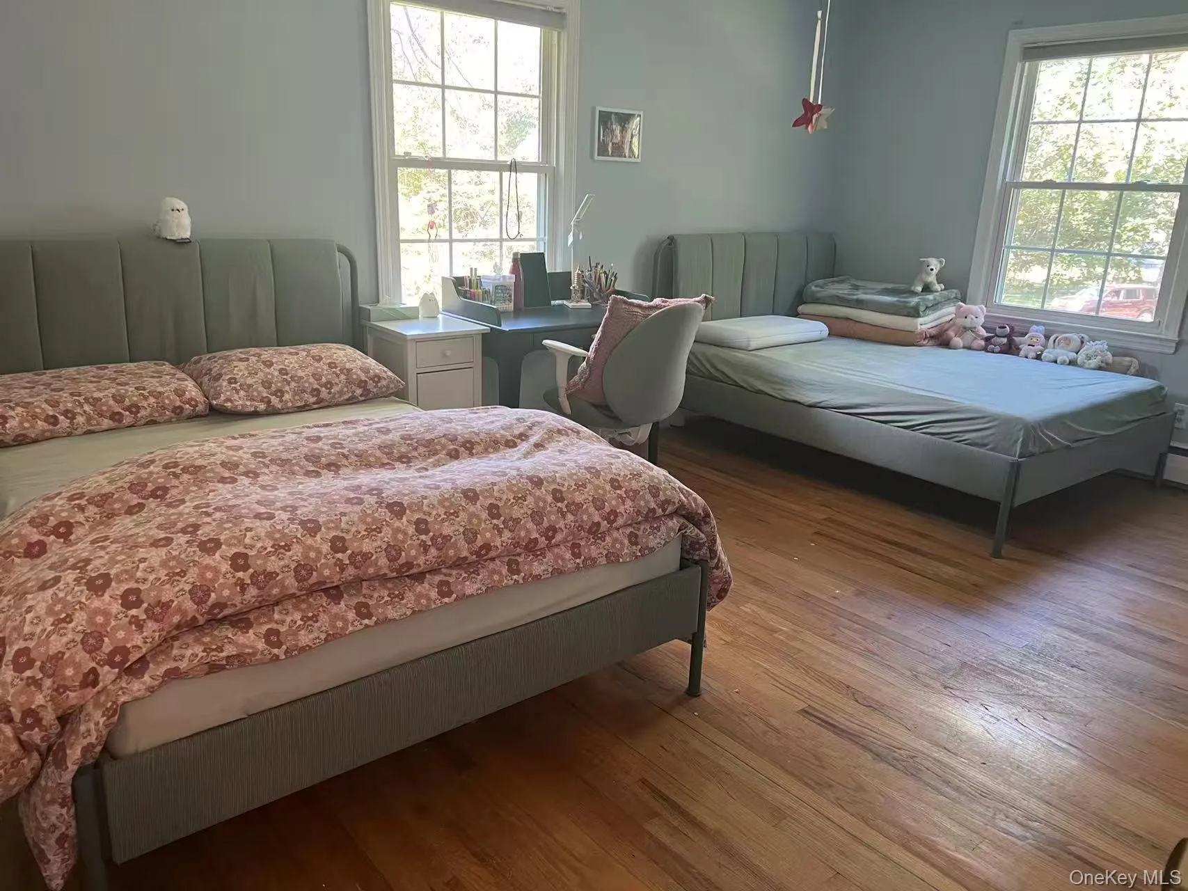 Bedroom featuring hardwood / wood-style floors Bedroom featuring hardwood / wood-style floors