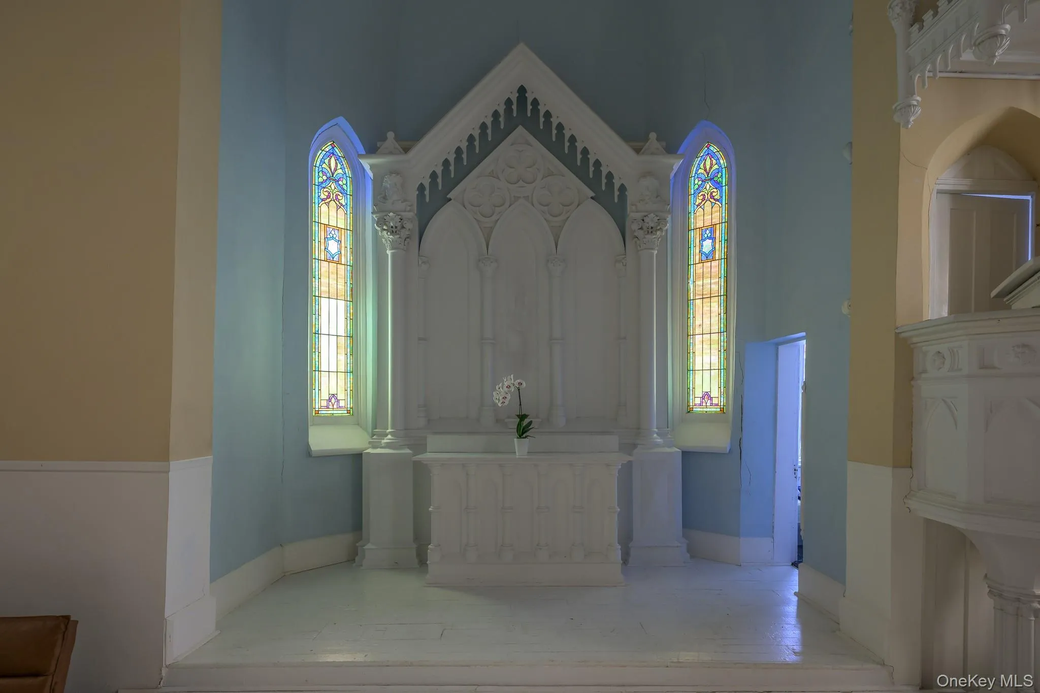Full bathroom with healthy amount of natural light and a high ceiling Full bathroom with healthy amount of natural light and a high ceiling