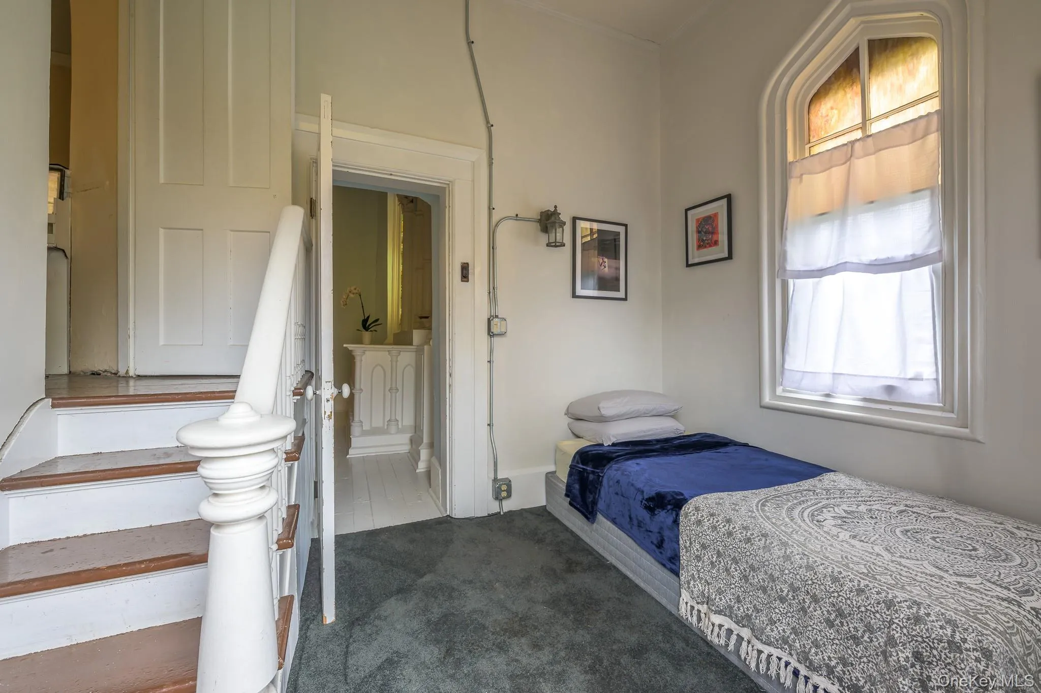 Bedroom featuring dark carpet Bedroom featuring dark carpet