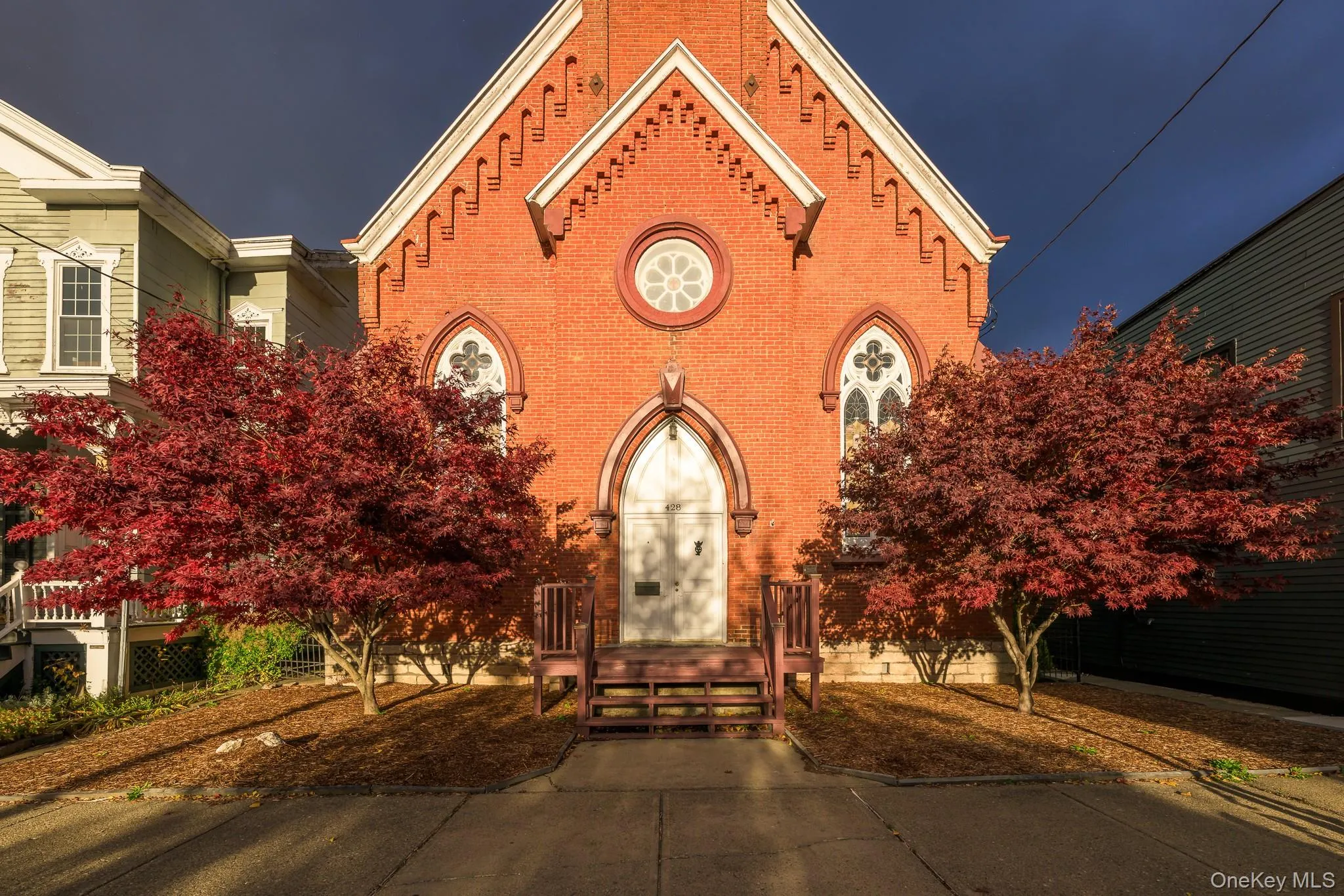 View of front of home with brick siding View of front of home with brick siding
