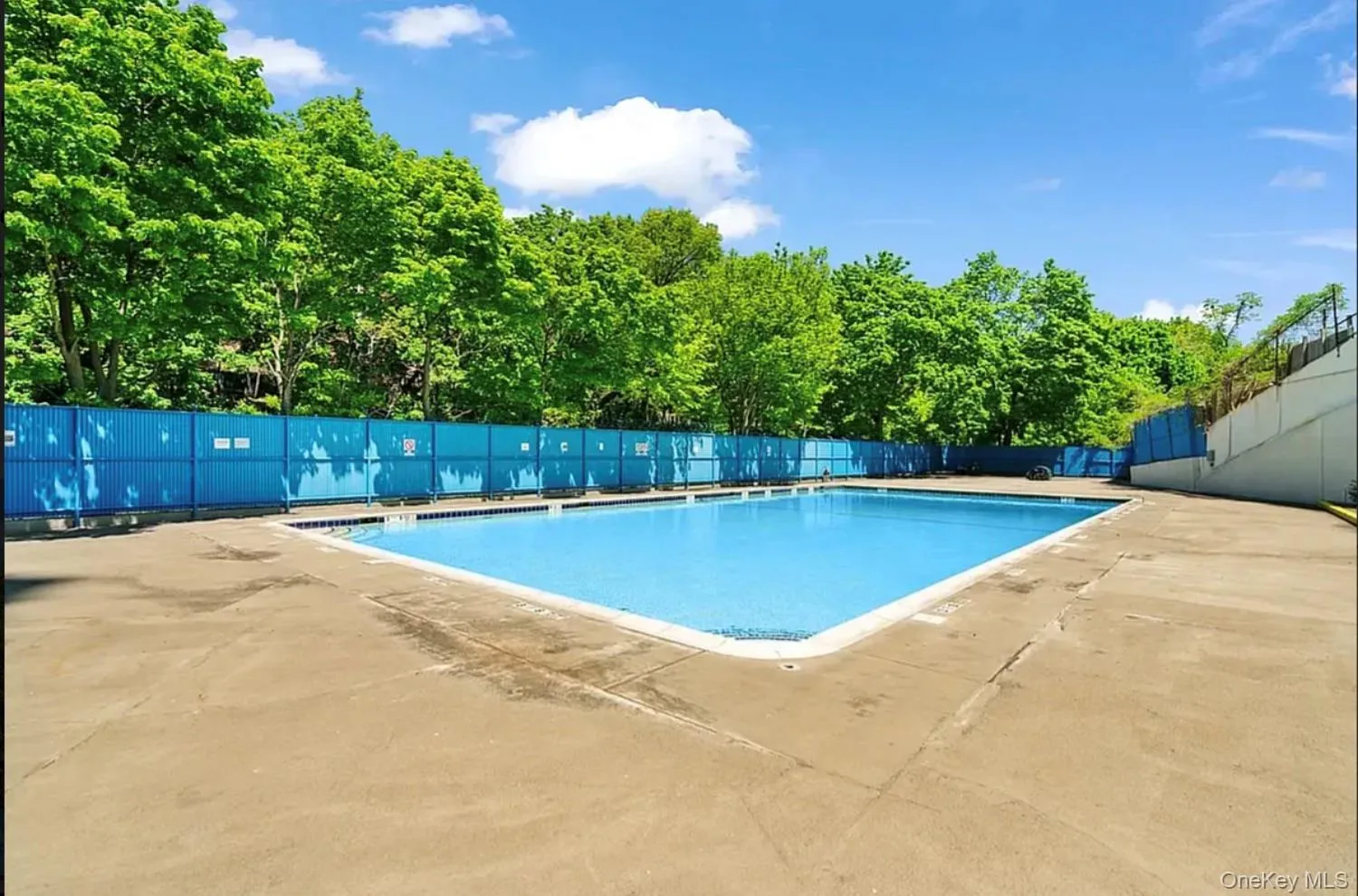 Community pool featuring a patio Community pool featuring a patio