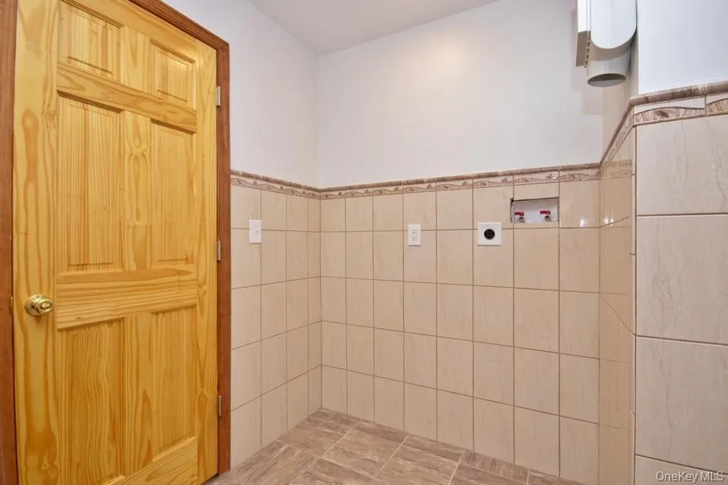 Bathroom with tile walls Bathroom with tile walls