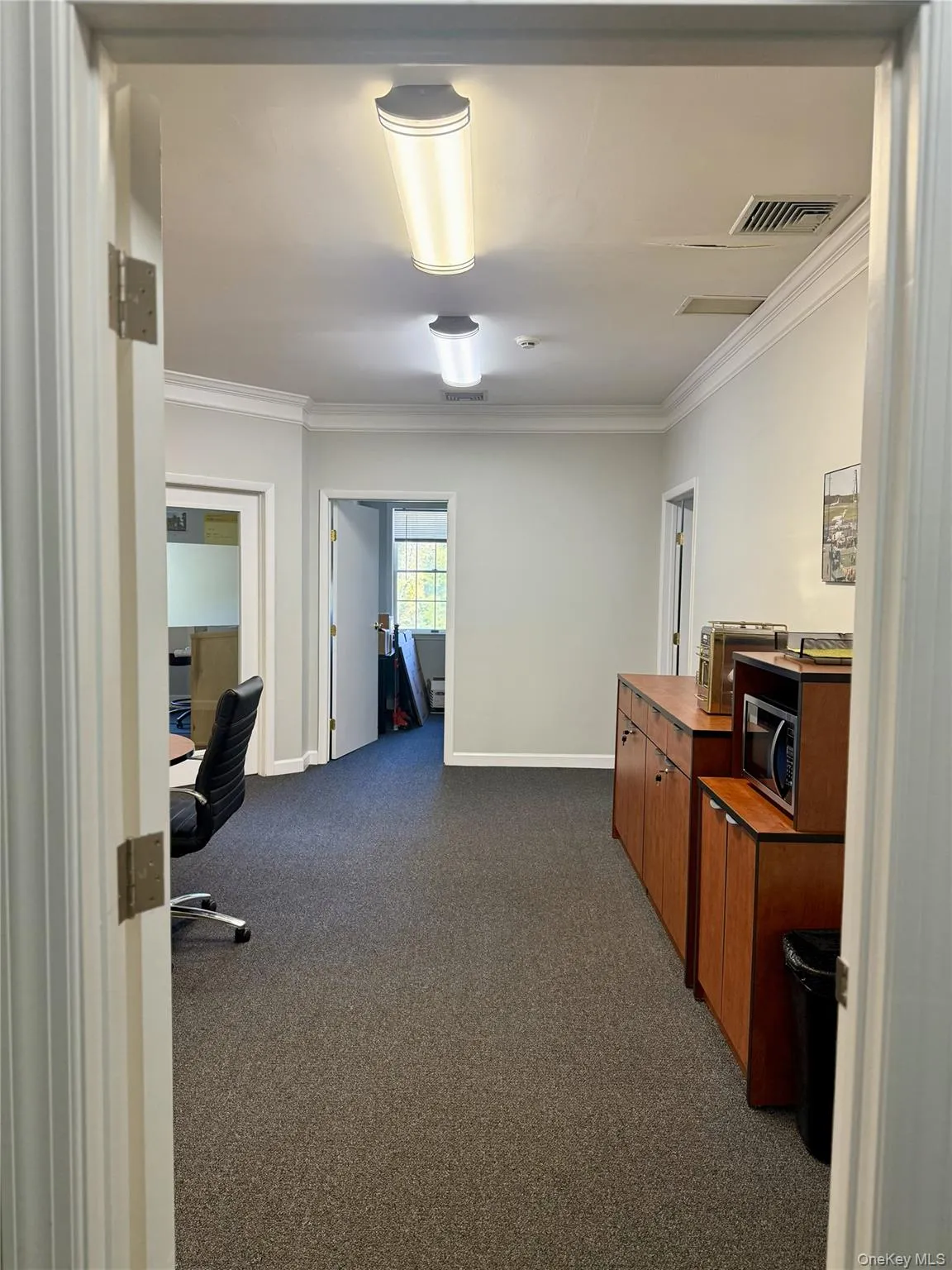 Office featuring ornamental molding Office featuring ornamental molding