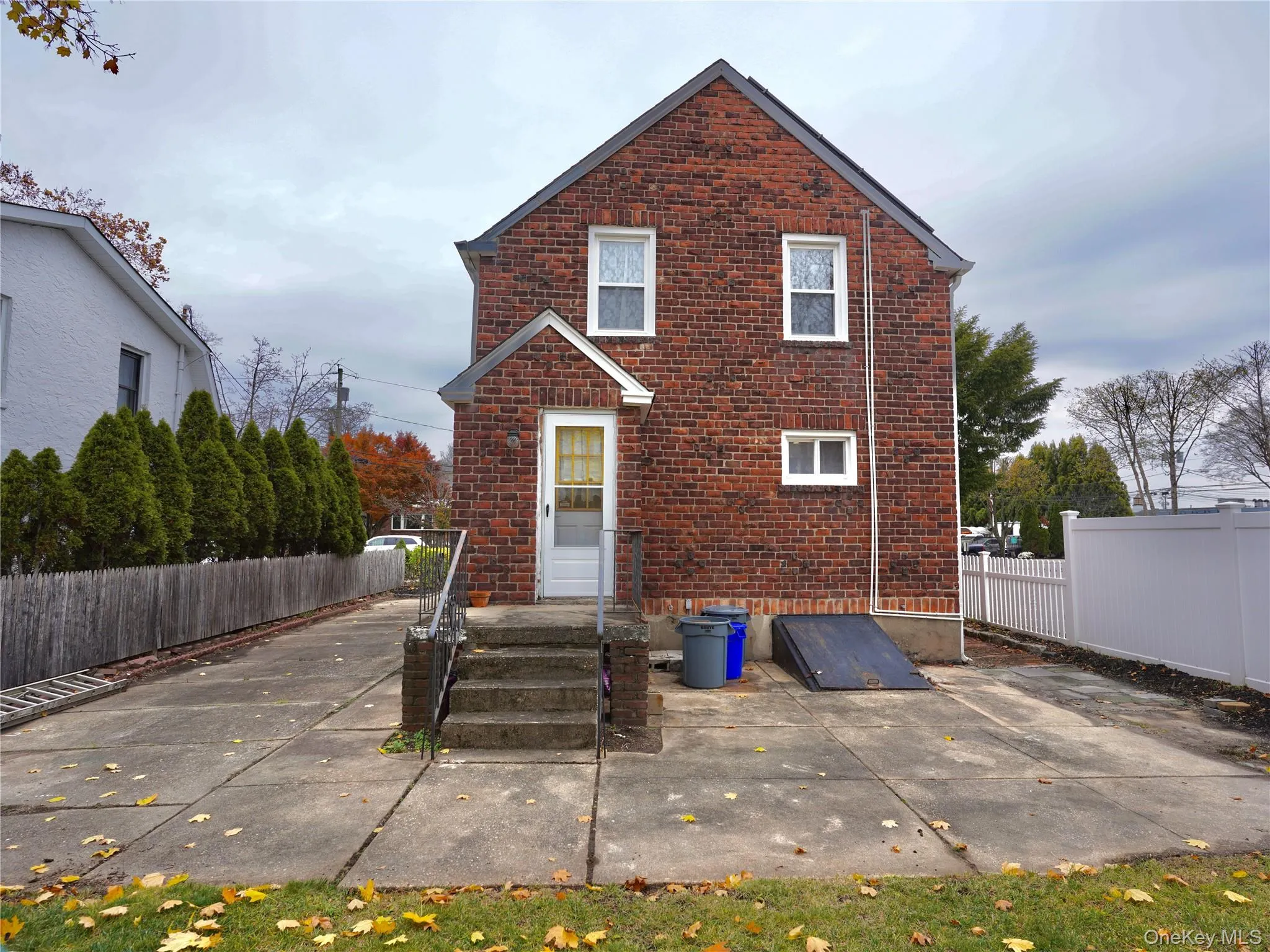 Rear view of house with brick siding Rear view of house with brick siding