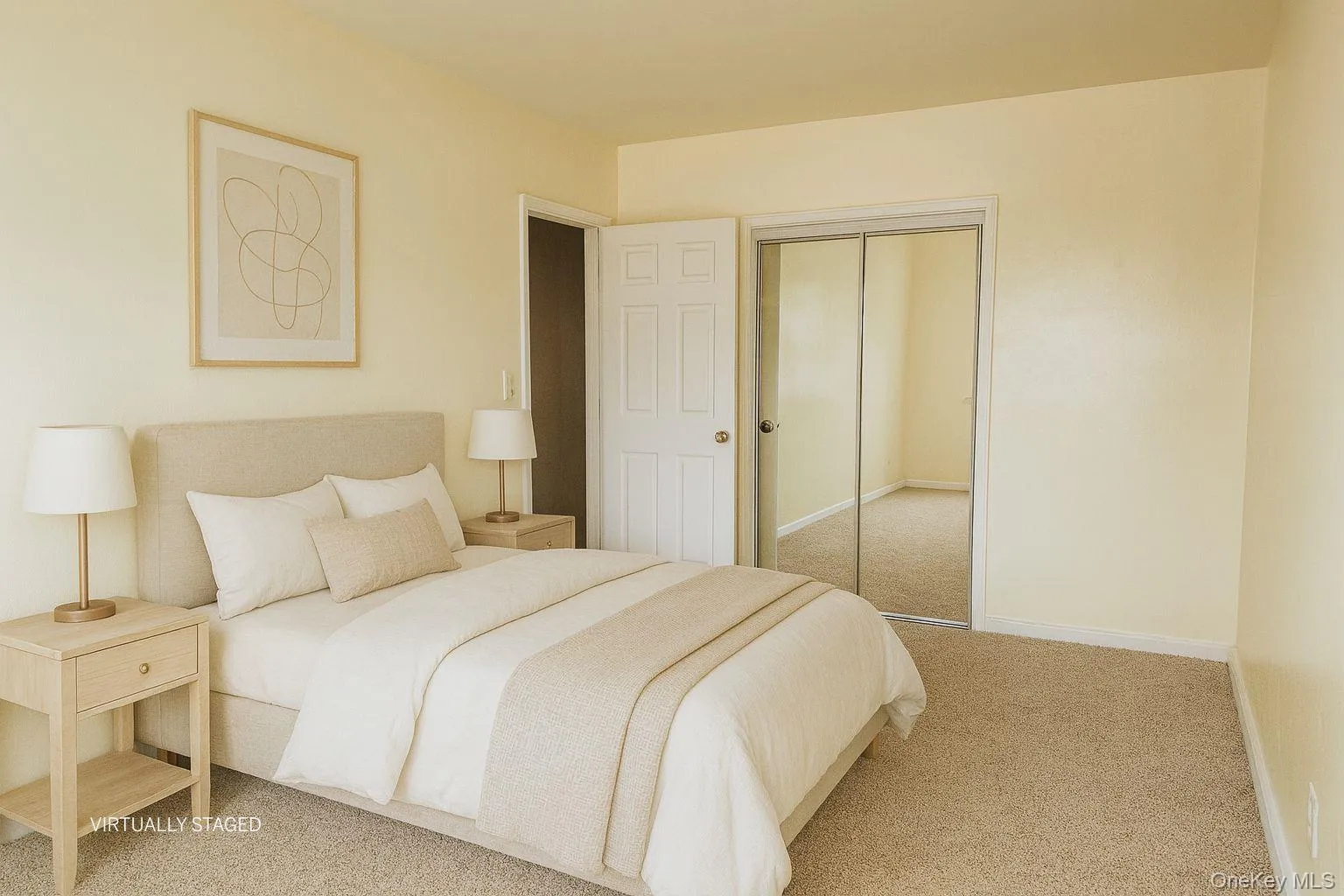 Carpeted bedroom with a closet and baseboards Carpeted bedroom with a closet and baseboards