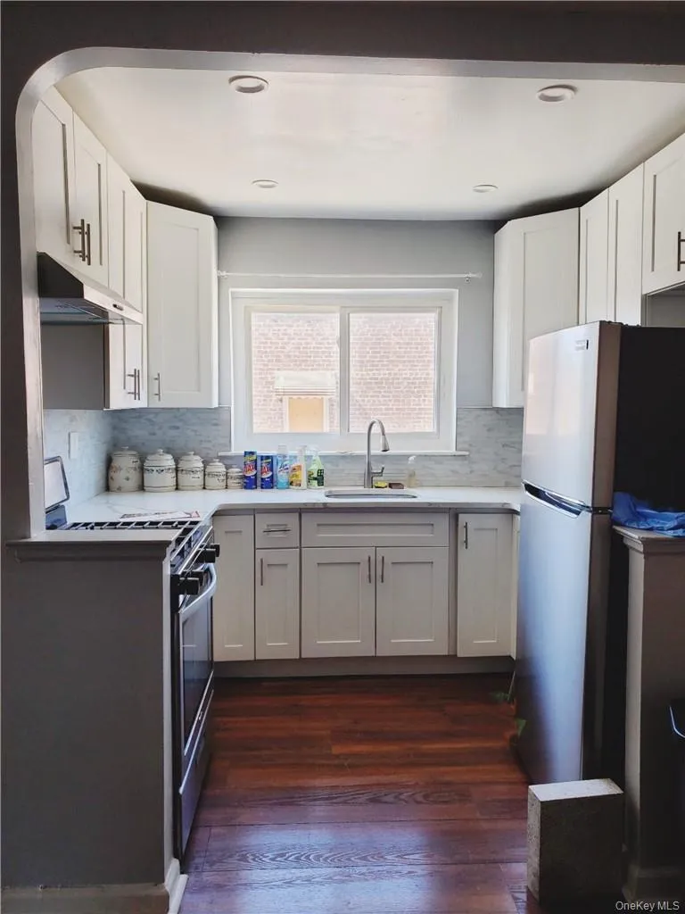 Updated kitchen with wood floors. Updated kitchen with wood floors.