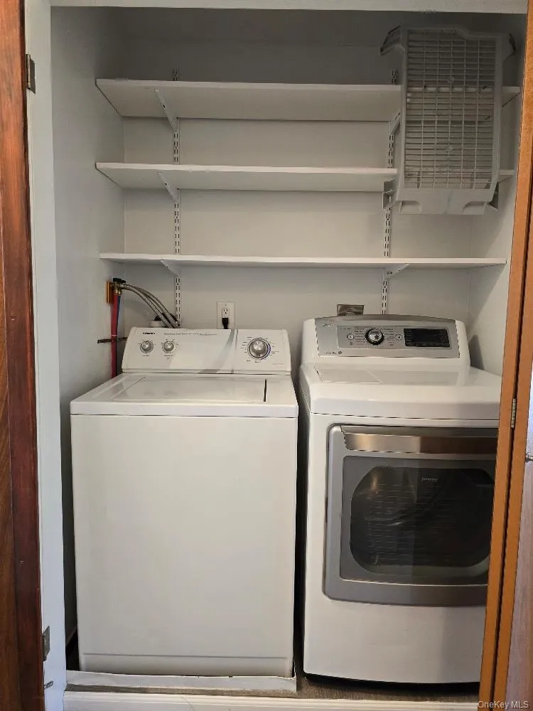 Laundry area with independent washer and dryer Laundry area with independent washer and dryer