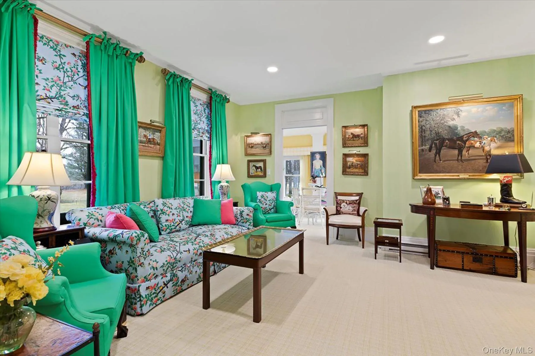 Carpeted living area with recessed lighting and baseboards Carpeted living area with recessed lighting and baseboards