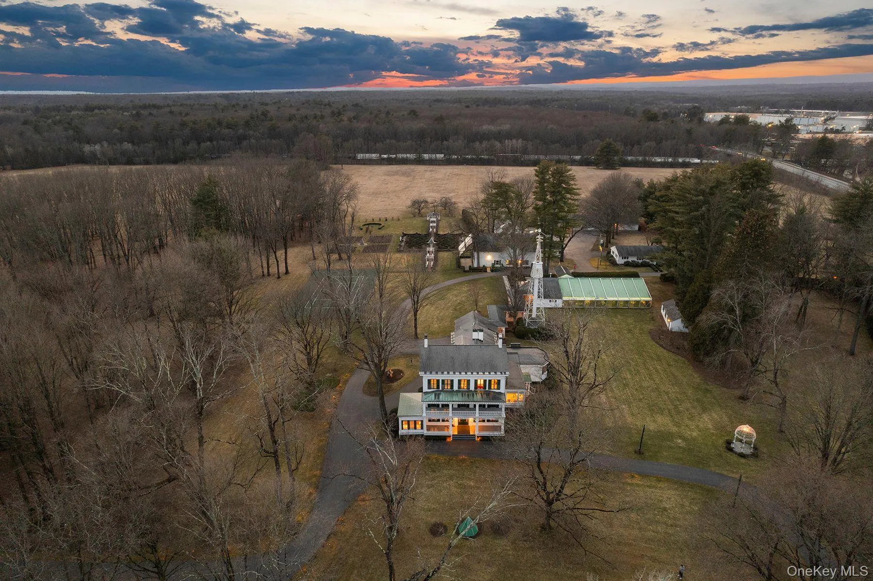 Aerial view of property and surrounding area featuring rural landscape Aerial view of property and surrounding area featuring rural landscape