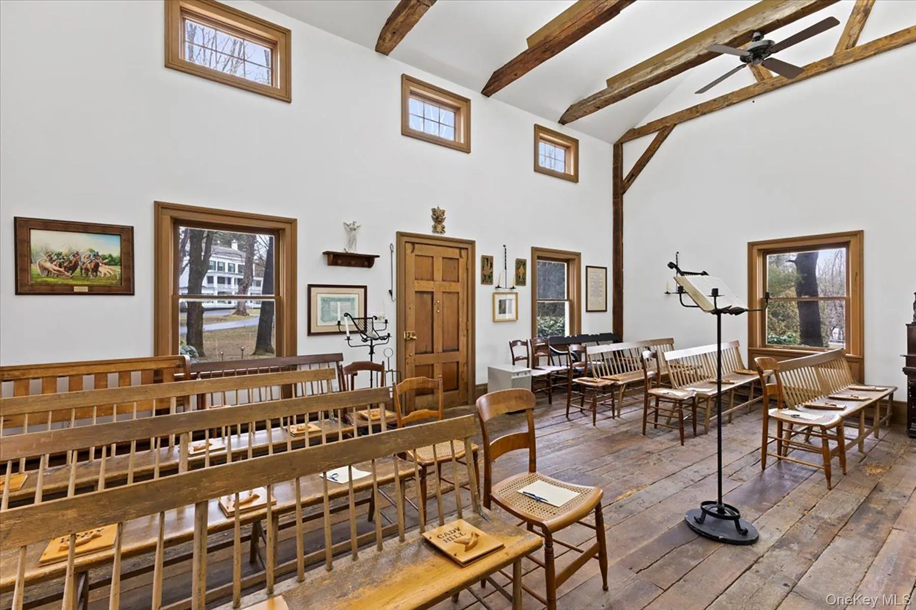 Dining space with beamed ceiling, high vaulted ceiling, healthy amount of natural light, wood-type flooring, and ceiling fan Dining space with beamed ceiling, high vaulted ceiling, healthy amount of natural light, wood-type flooring, and ceiling fan