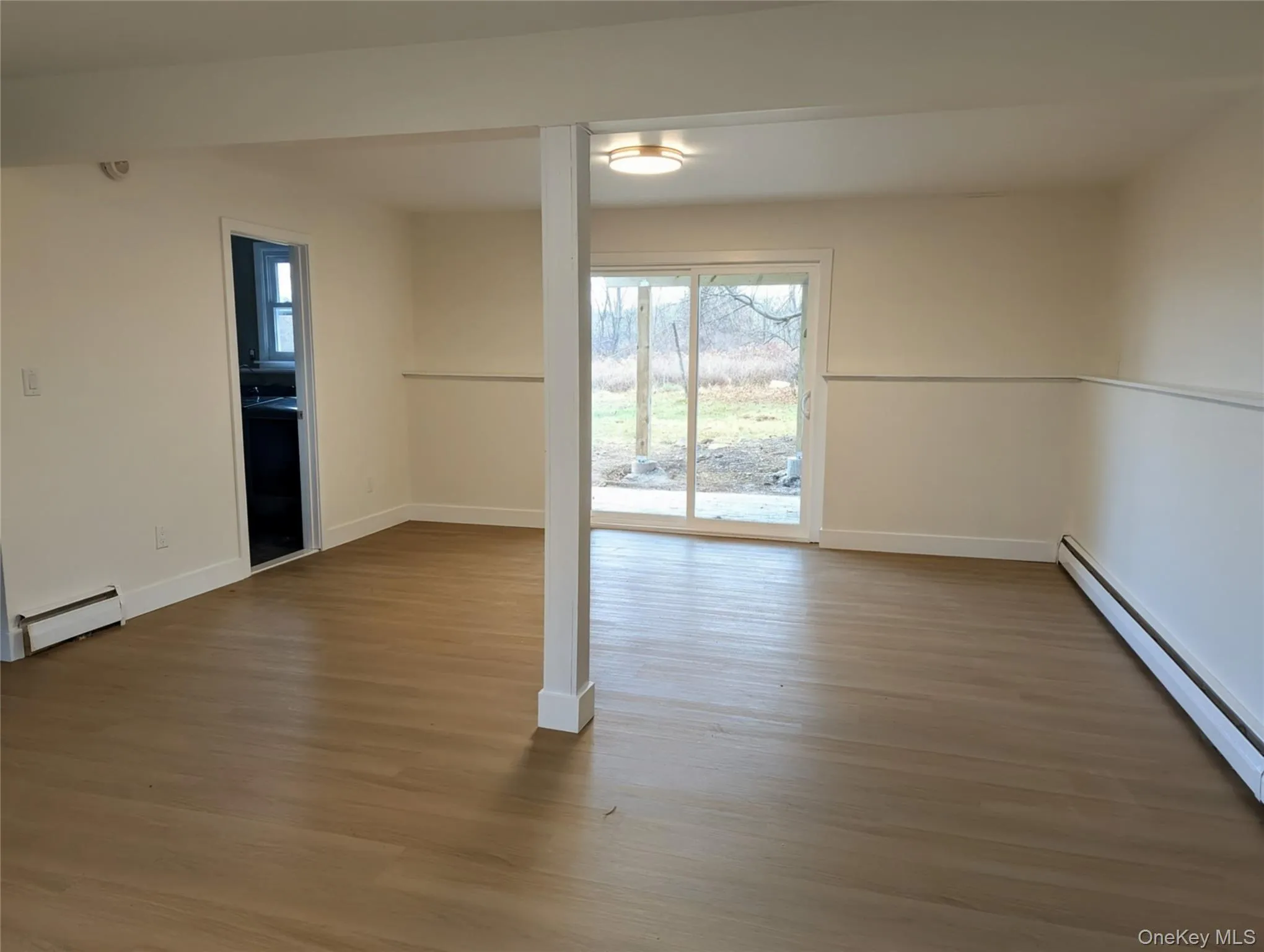 Finished lower level with a half bath and laundry room. Sliders to the backyard Finished lower level with a half bath and laundry room. Sliders to the backyard