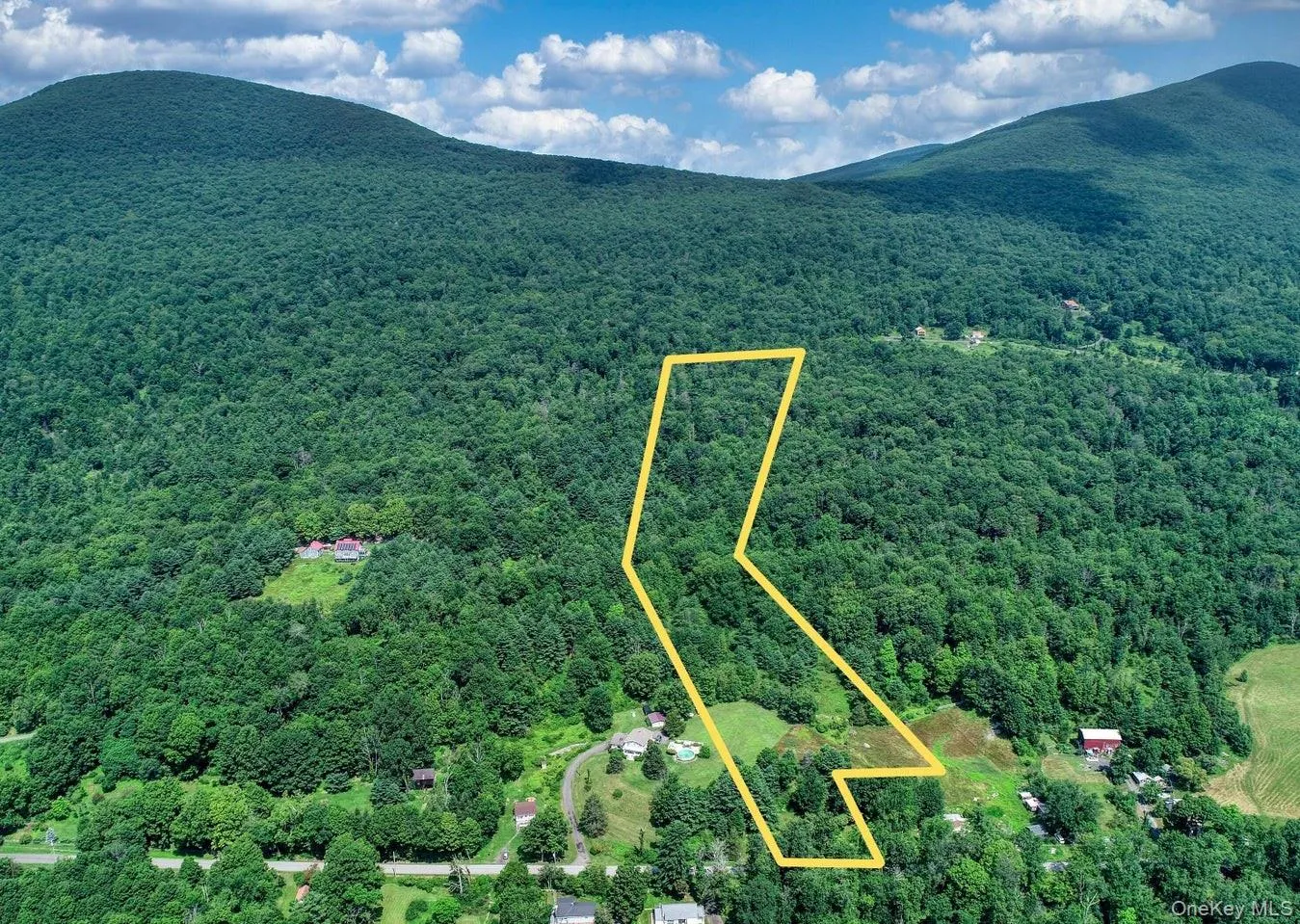 Drone / aerial view of a mountain backdrop Drone / aerial view of a mountain backdrop