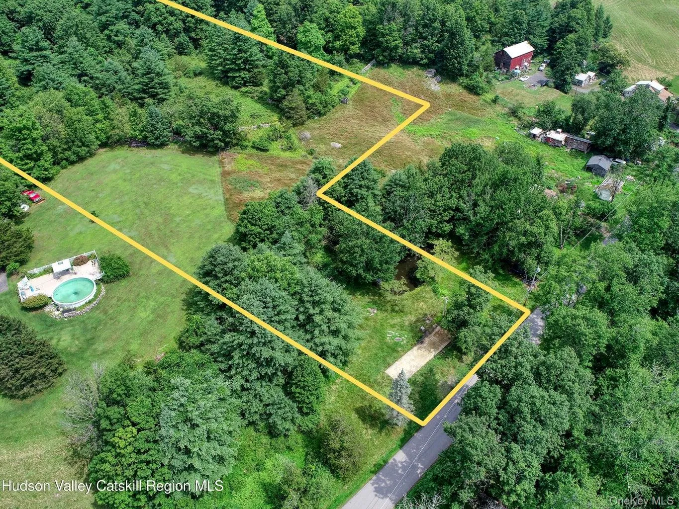 Aerial overview of property's location featuring property boundaries highlighted Aerial overview of property's location featuring property boundaries highlighted