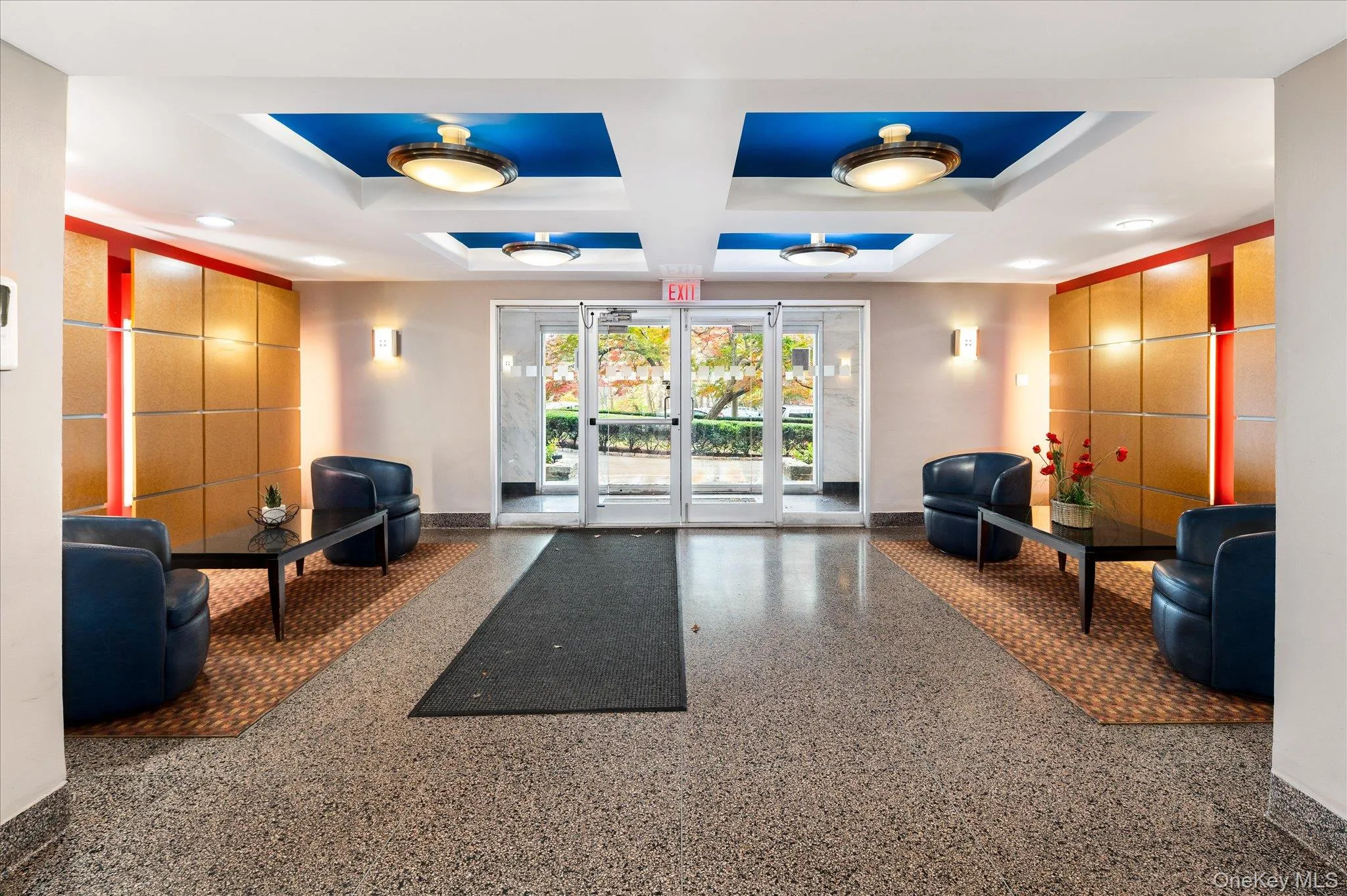Lobby featuring coffered ceiling and beam ceiling Lobby featuring coffered ceiling and beam ceiling