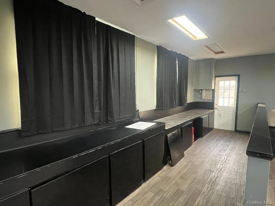 Kitchen featuring light wood-style floors Kitchen featuring light wood-style floors