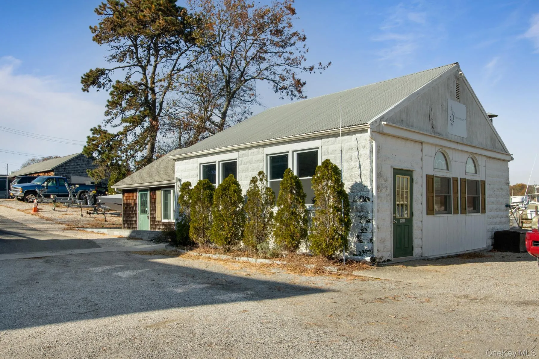 View of home's exterior featuring a metal roof View of home's exterior featuring a metal roof