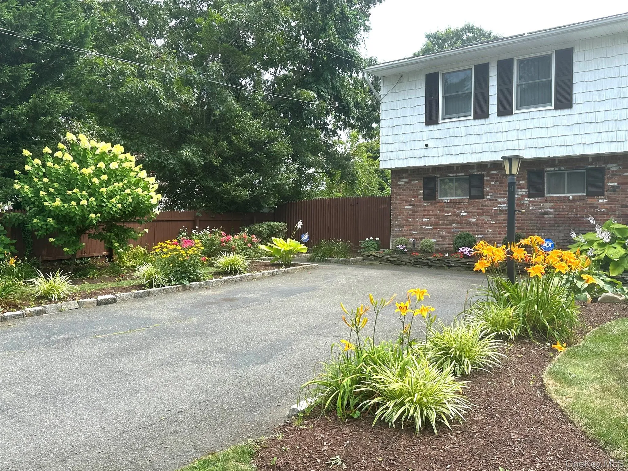 View of side of home with brick siding View of side of home with brick siding