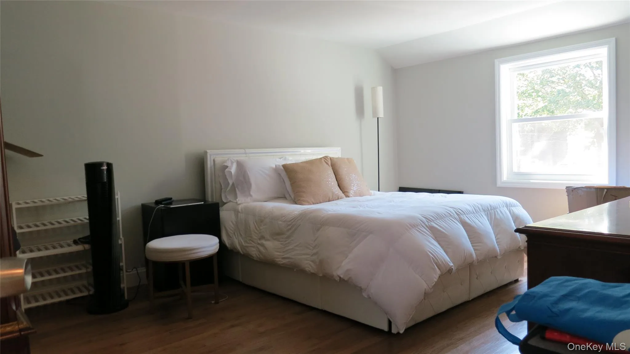 Bedroom with wood finished floors Bedroom with wood finished floors