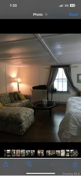 Bedroom featuring radiator heating unit Bedroom featuring radiator heating unit