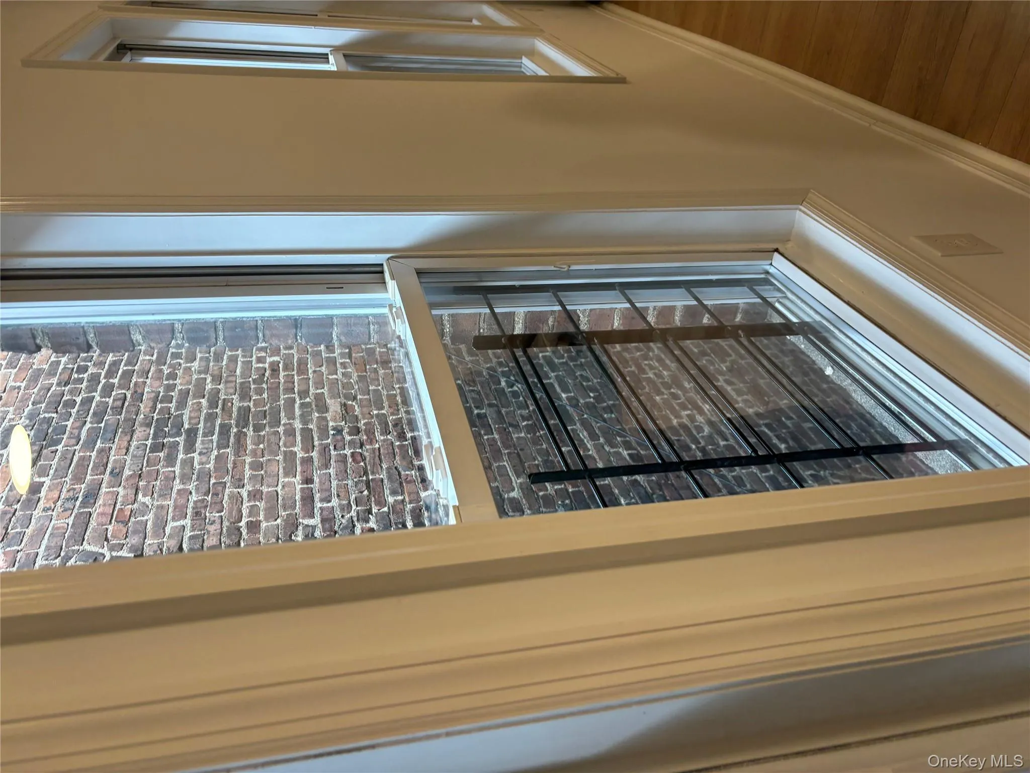 Detailed view of baseboards and wood finished floors Detailed view of baseboards and wood finished floors