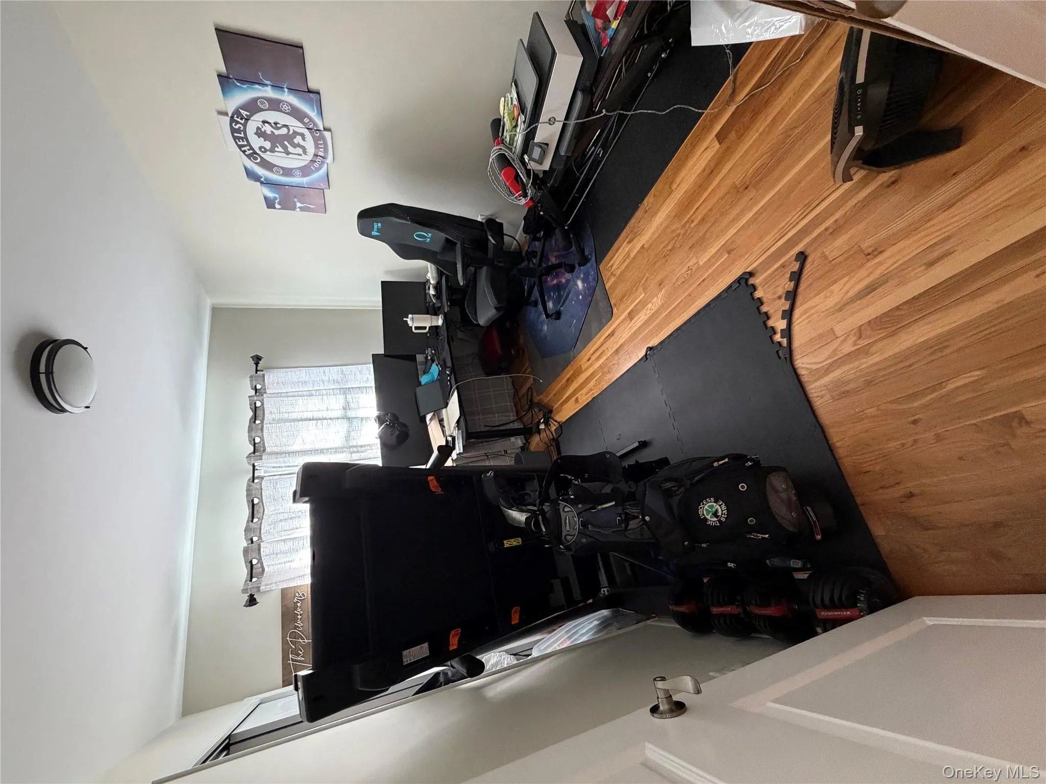 Bedroom with wood finished floors Bedroom with wood finished floors