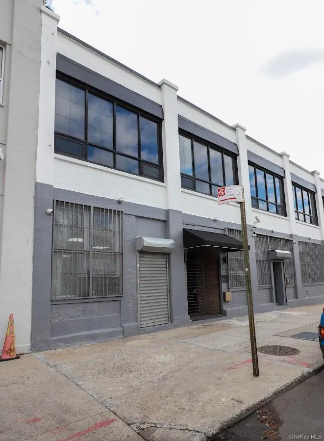 View of front of property featuring stucco siding View of front of property featuring stucco siding