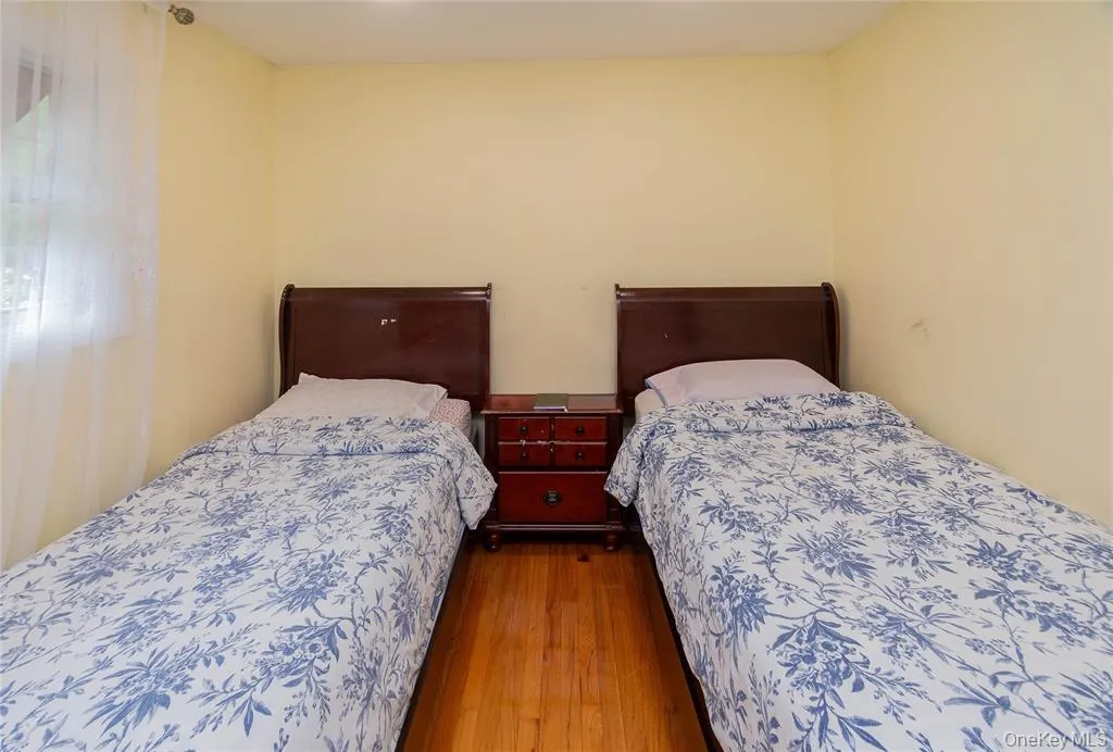 Bedroom with wood finished floors Bedroom with wood finished floors