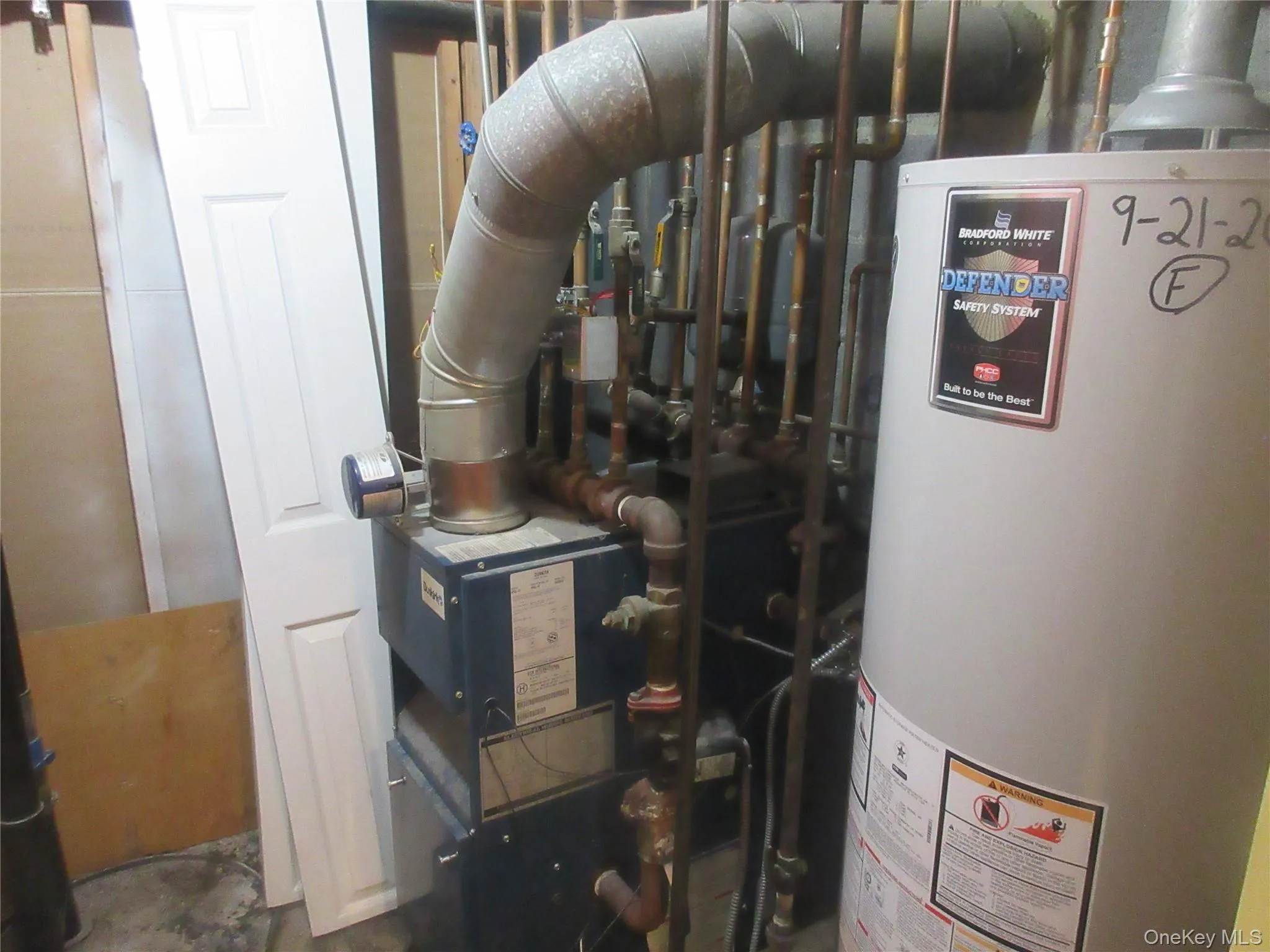 Utilities featuring water heater Utilities featuring water heater