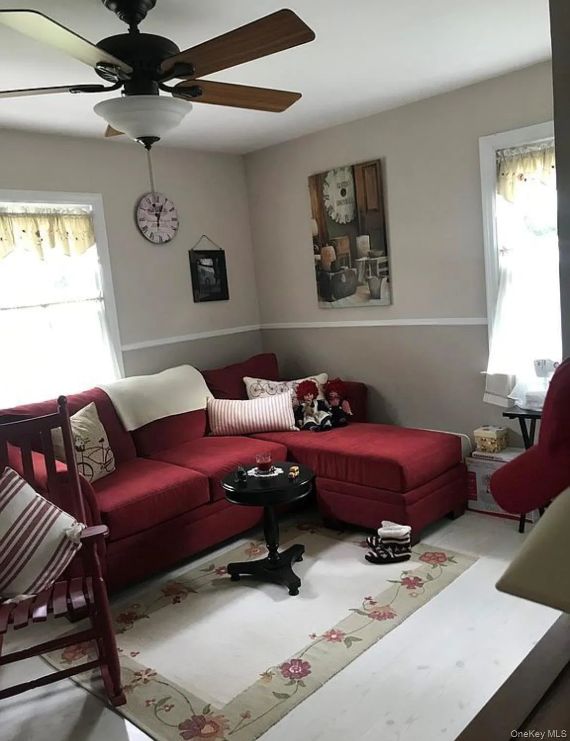 Living room featuring ceiling fan Living room featuring ceiling fan