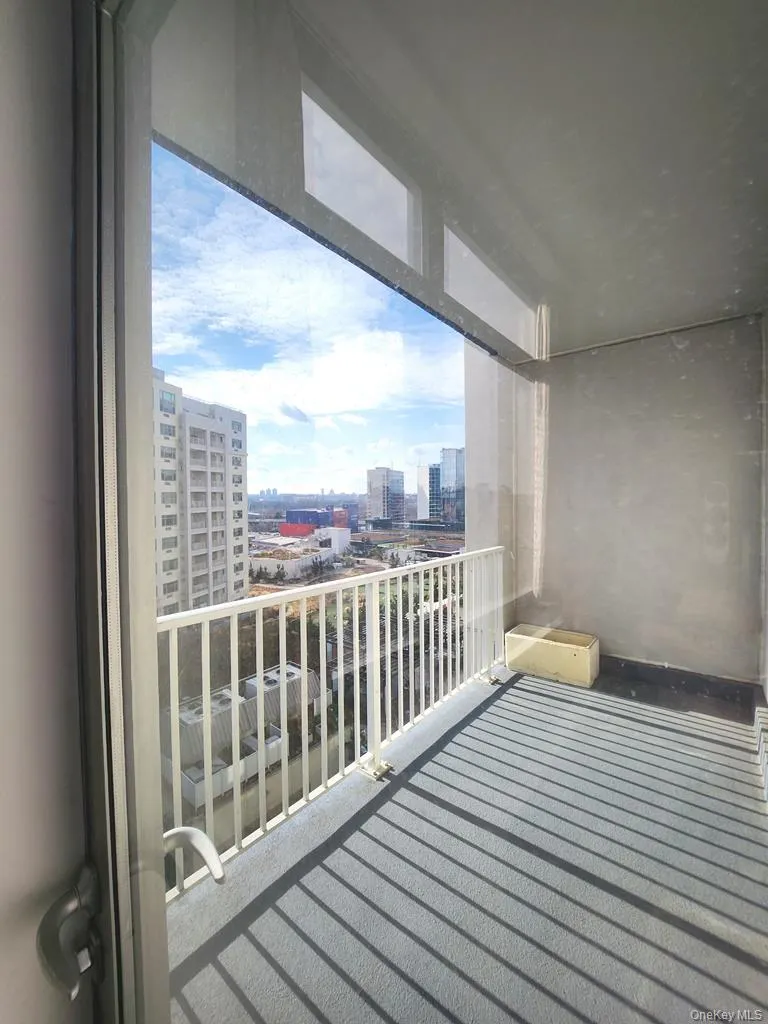 Balcony with a city view and elevator Balcony with a city view and elevator