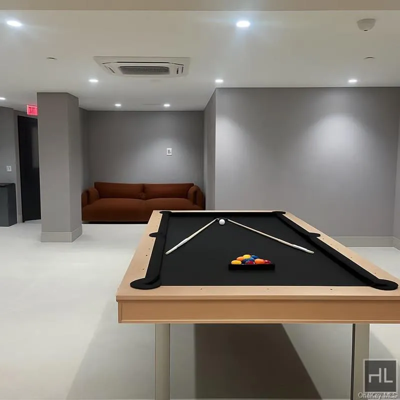 Rec room with recessed lighting, cooling unit, and pool table Rec room with recessed lighting, cooling unit, and pool table