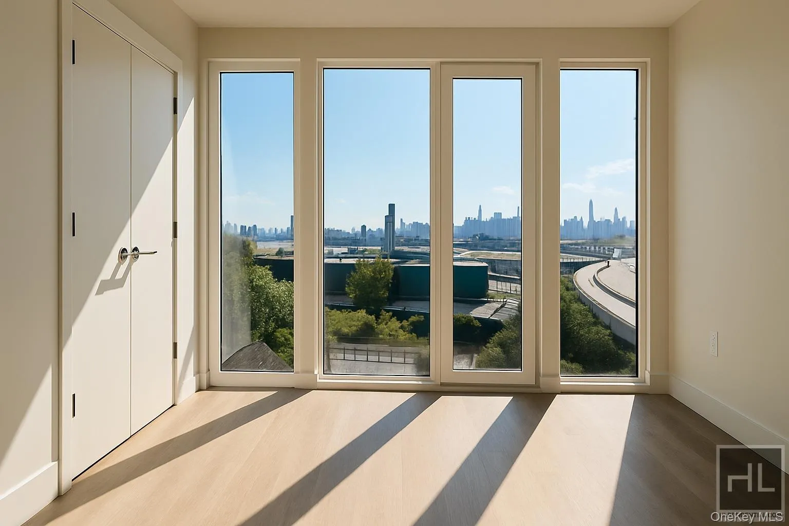 Doorway with wood finished floors and a skyline view Doorway with wood finished floors and a skyline view