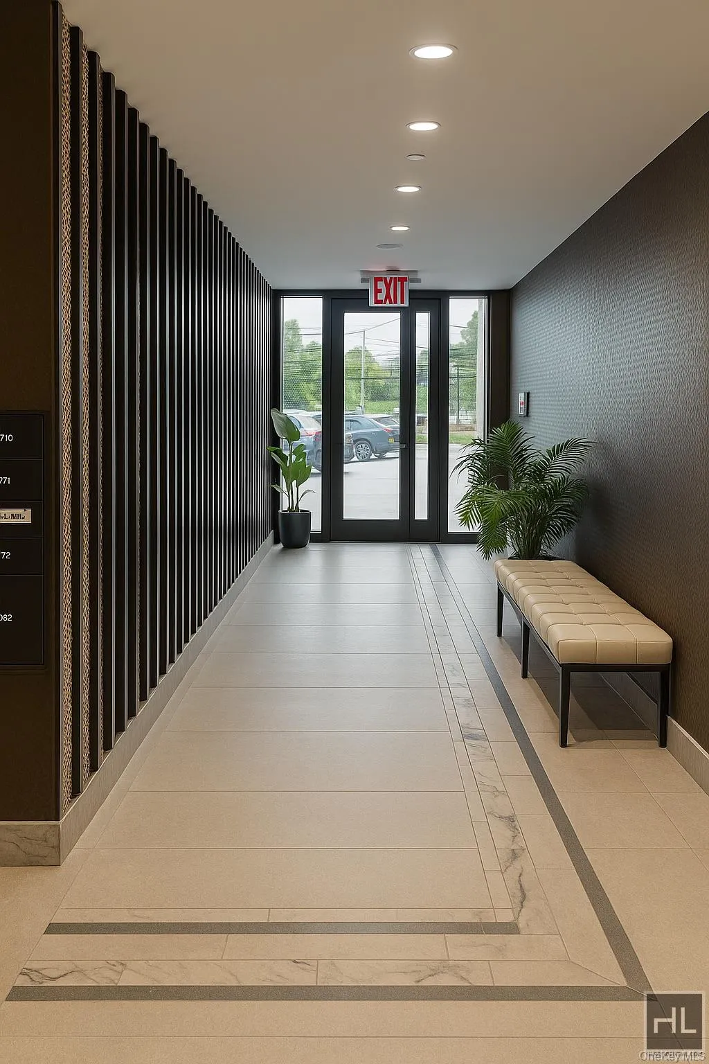 Lobby featuring floor to ceiling windows and recessed lighting Lobby featuring floor to ceiling windows and recessed lighting