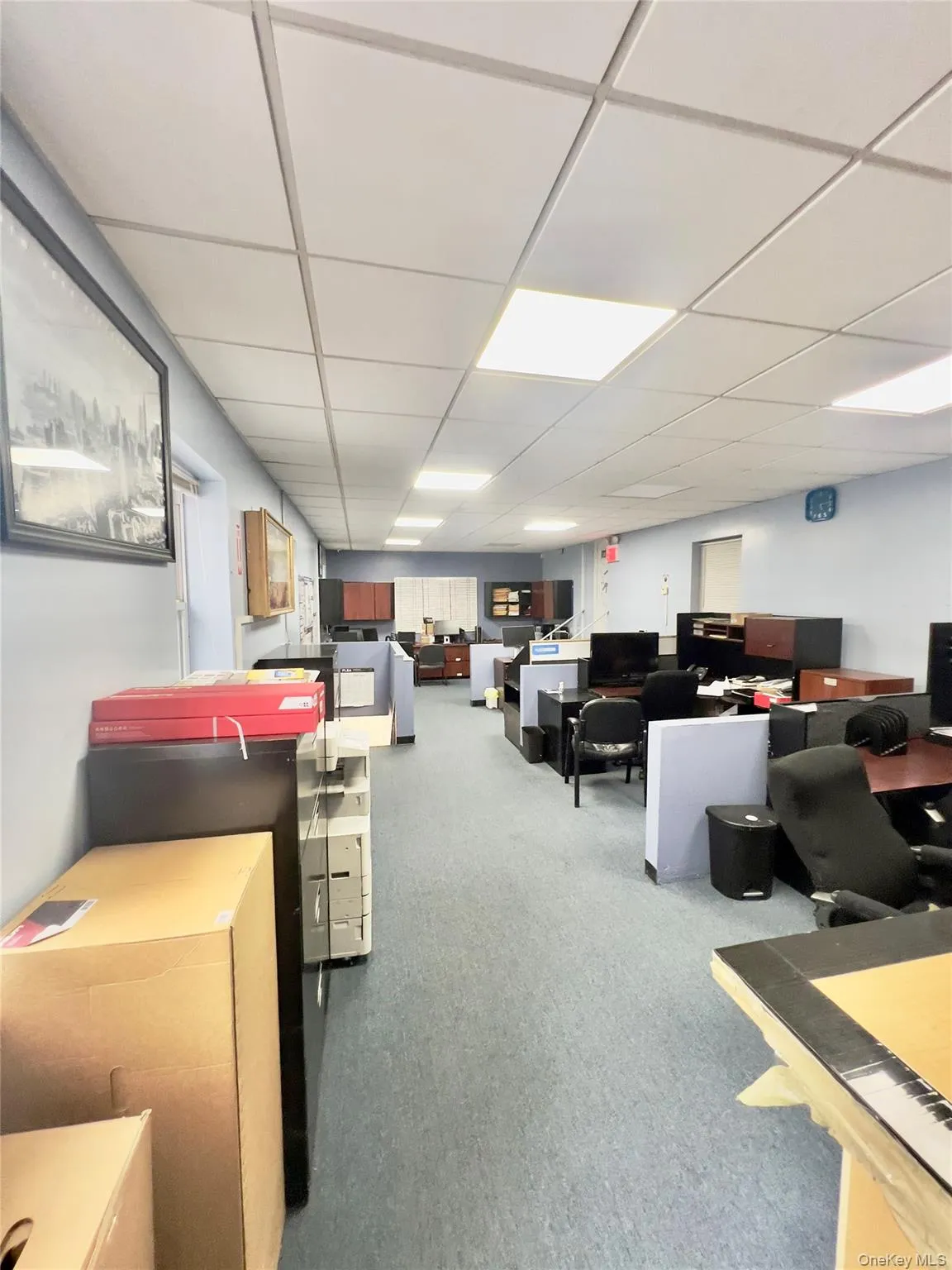 Office area featuring a paneled ceiling Office area featuring a paneled ceiling