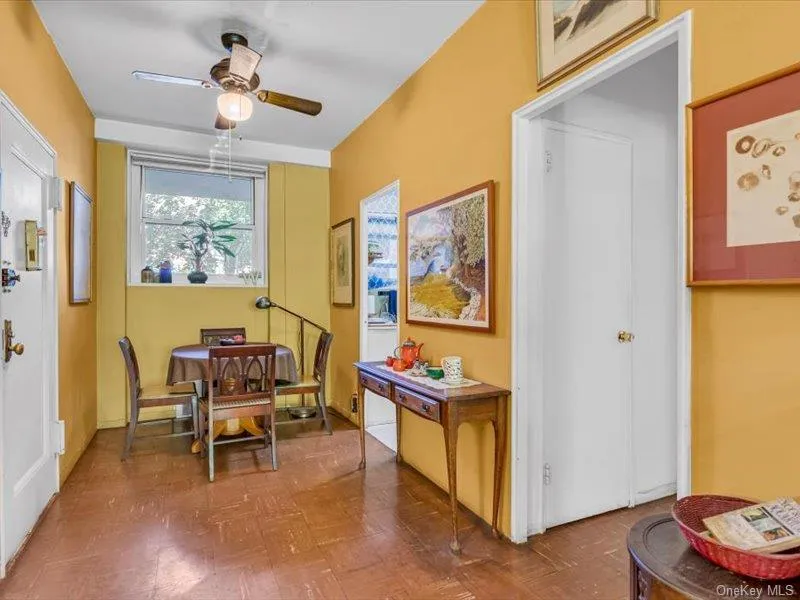 Dining room with a ceiling fan Dining room with a ceiling fan