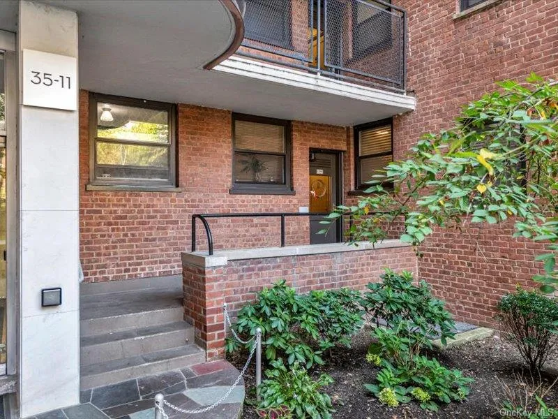 Doorway to property with brick siding Doorway to property with brick siding