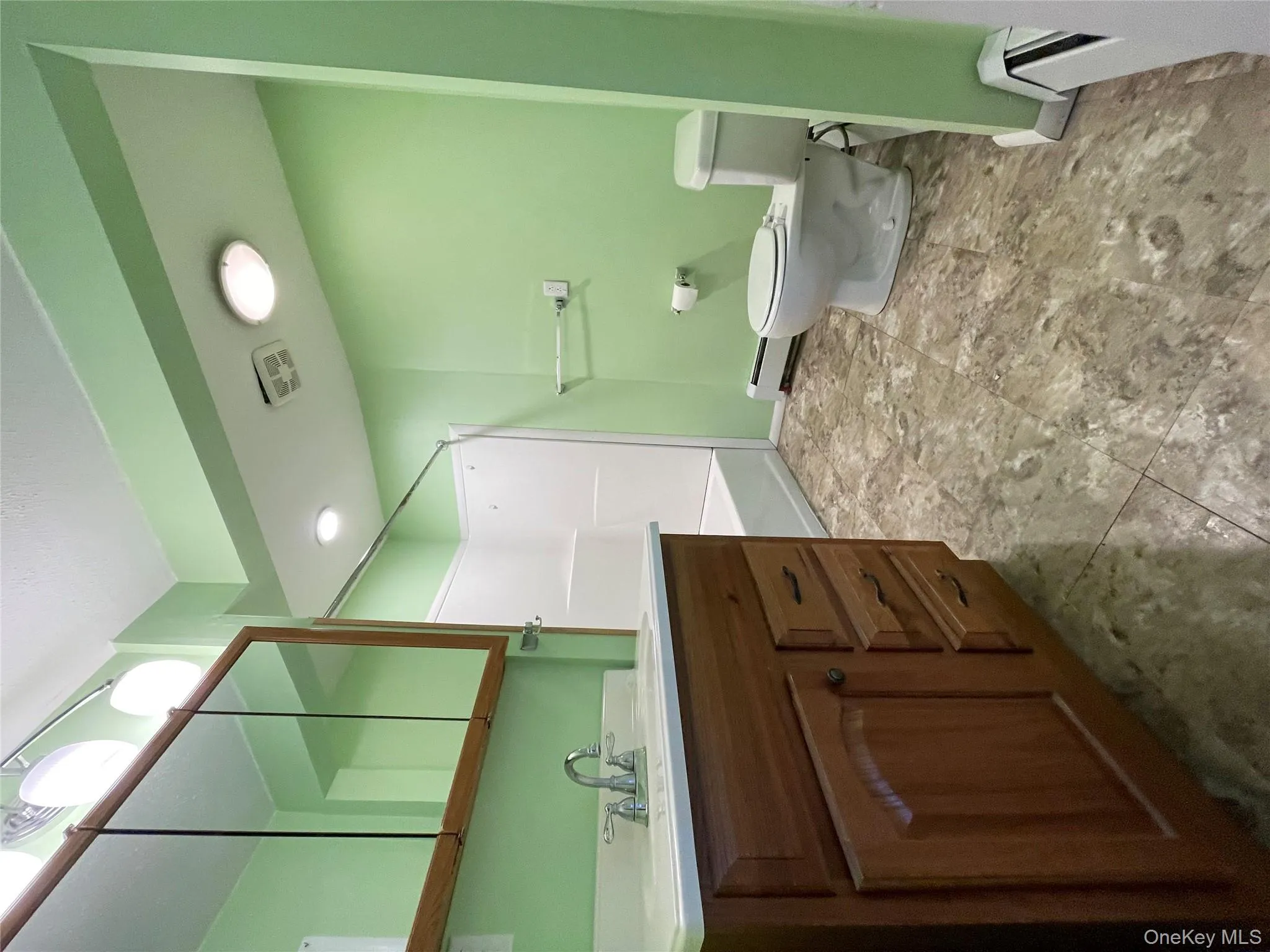 Updated, Full bathroom with vanity, toilet, tub / shower combination Updated, Full bathroom with vanity, toilet, tub / shower combination