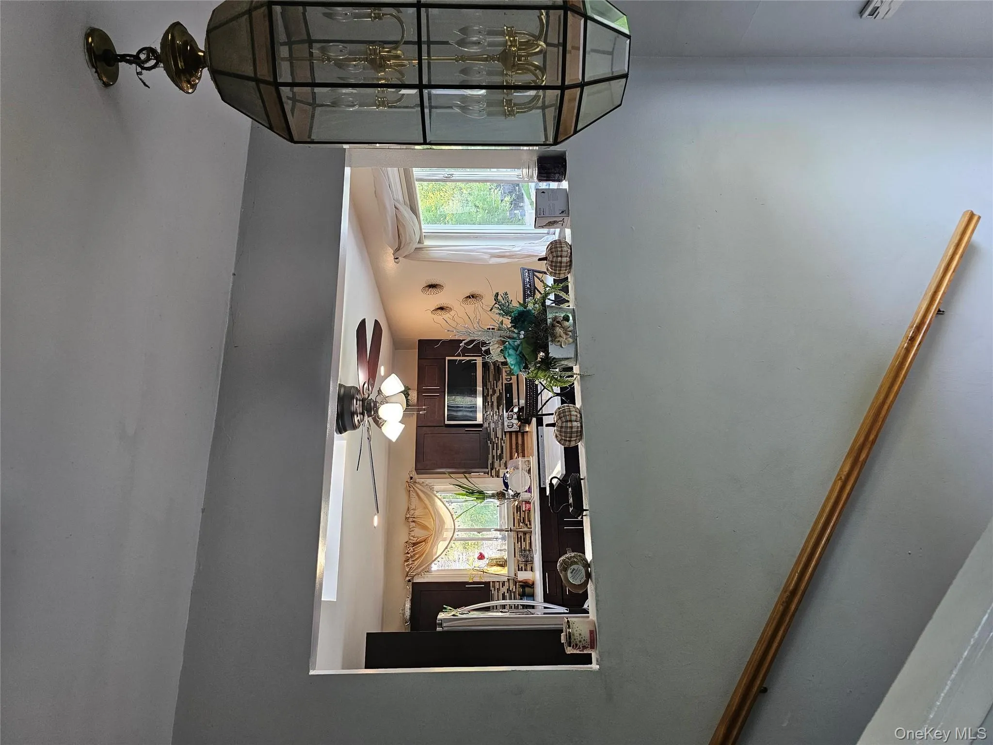 Kitchen with fridge and a ceiling fan Kitchen with fridge and a ceiling fan