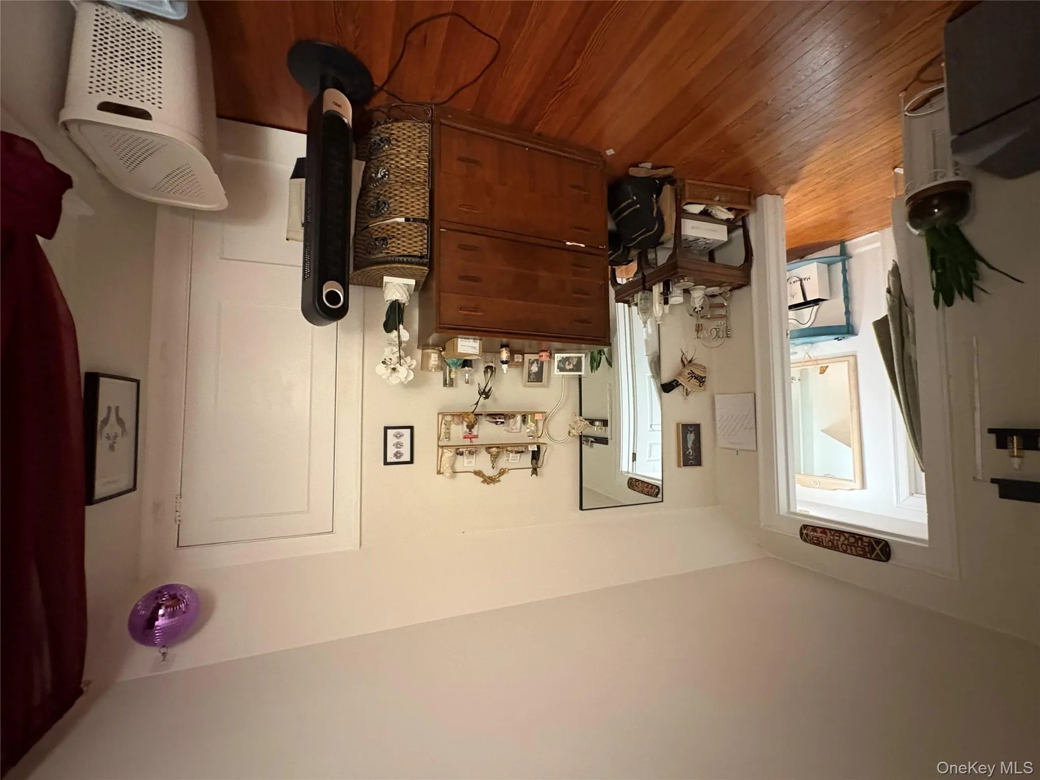 Bedroom featuring wood finished floors Bedroom featuring wood finished floors