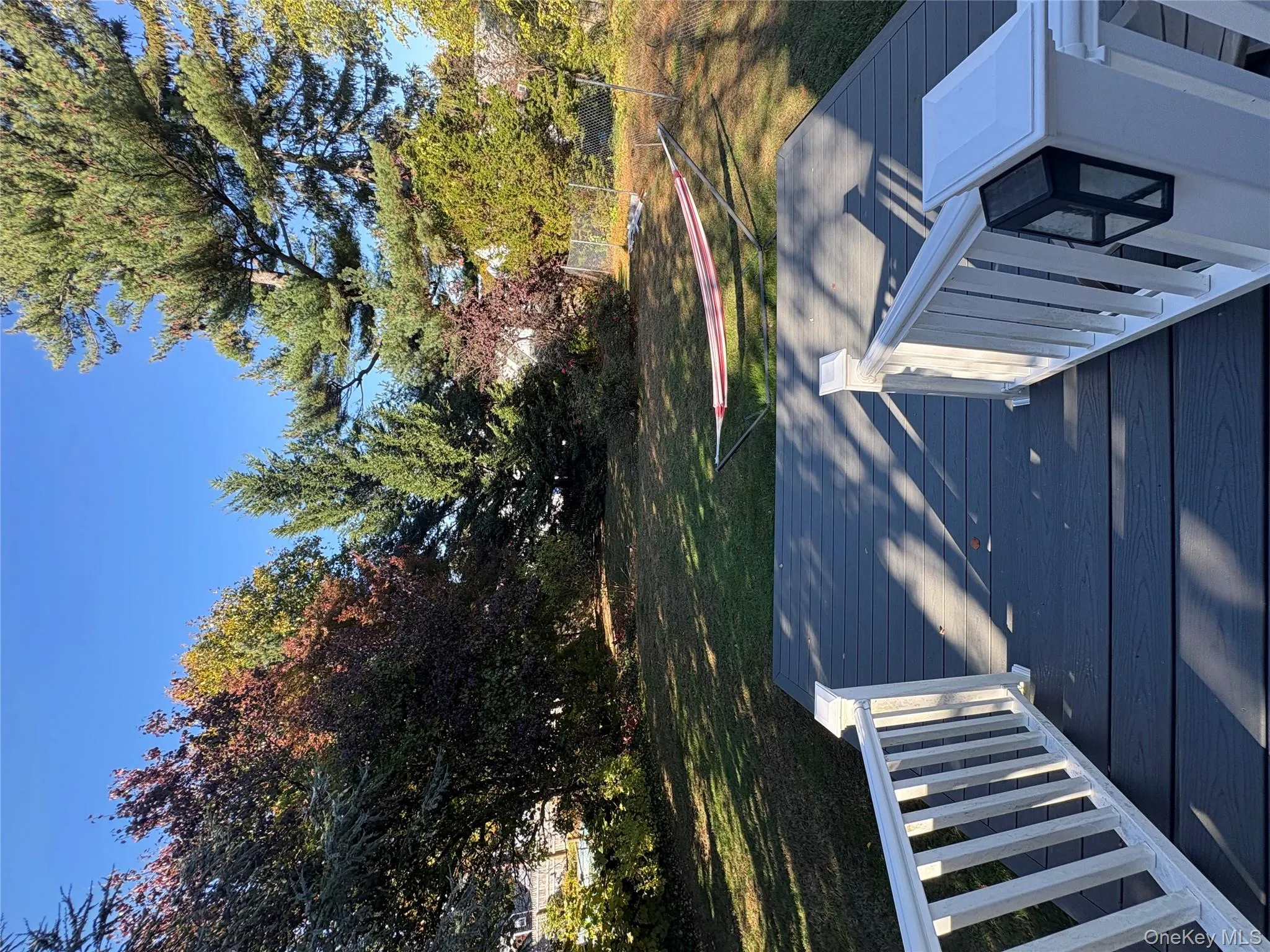 Wooden terrace with a yard Wooden terrace with a yard