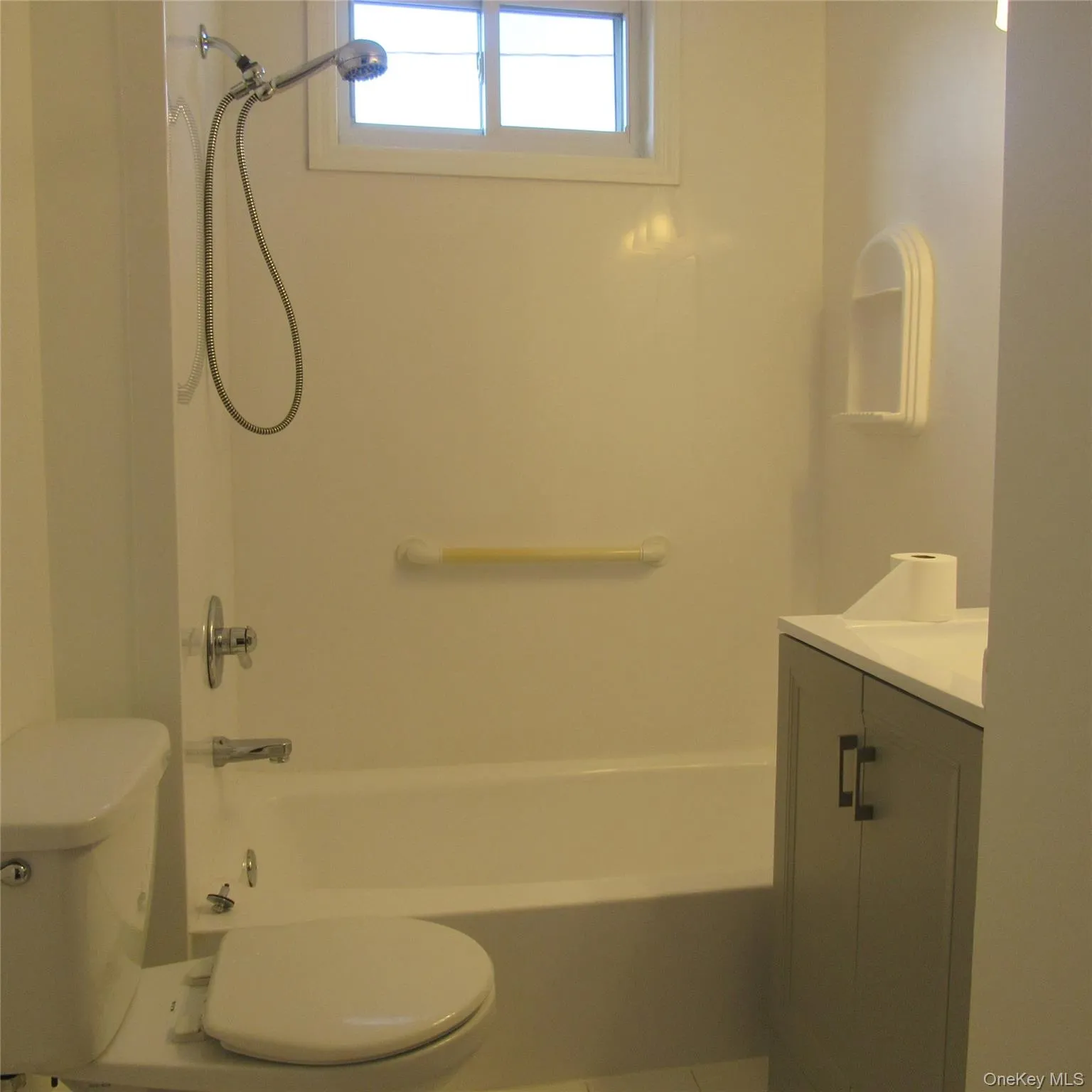 Full main bath with vanity, shower / bathtub combination, and tile patterned flooring Full main bath with vanity, shower / bathtub combination, and tile patterned flooring