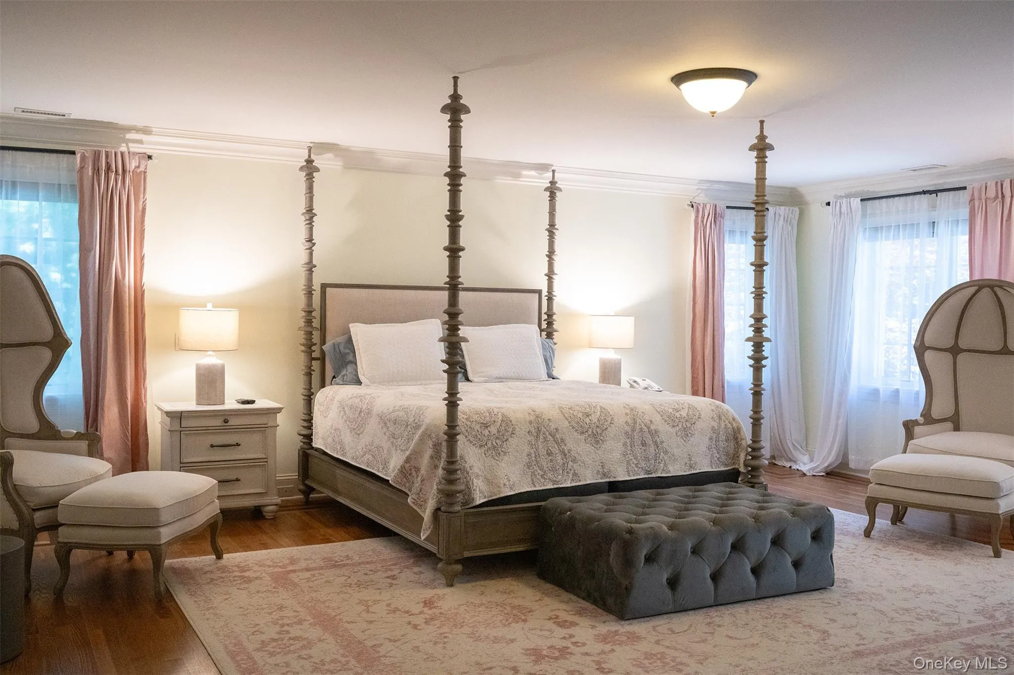 Large primary bedroom suite with walk-in closet and large double sink custom cabinets in the bathroom. Large primary bedroom suite with walk-in closet and large double sink custom cabinets in the bathroom.